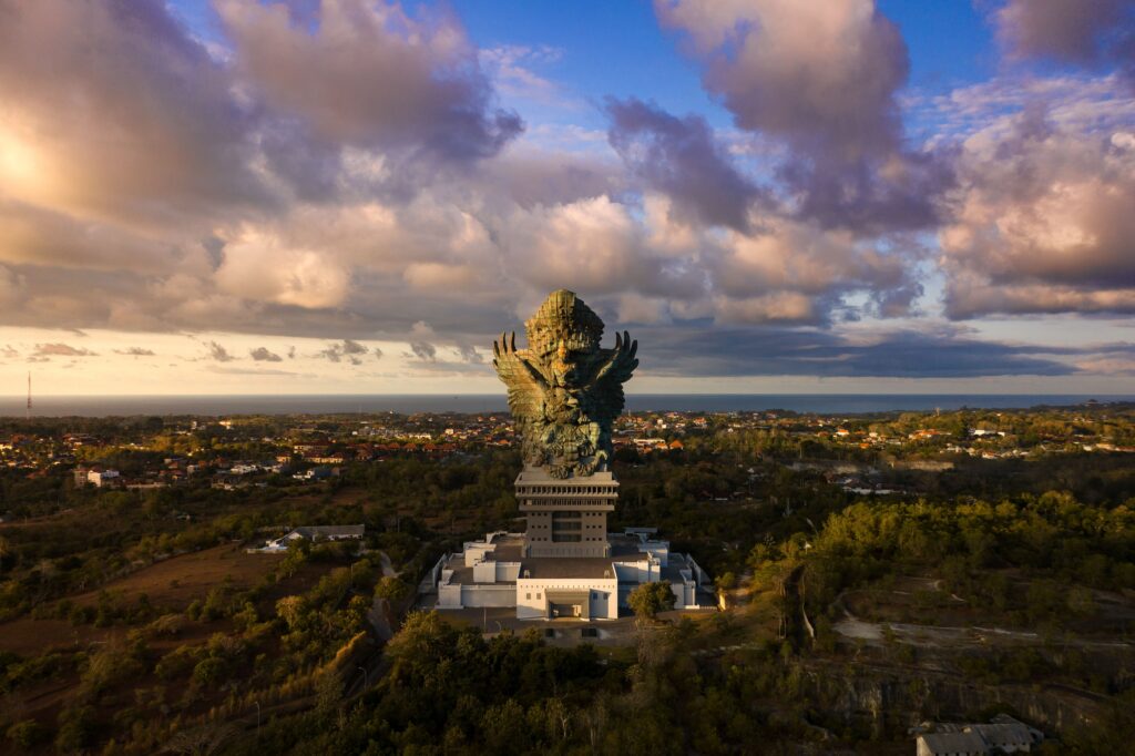 Aerial view of GWK statue in Bali near Jimbaran luxury property listings.