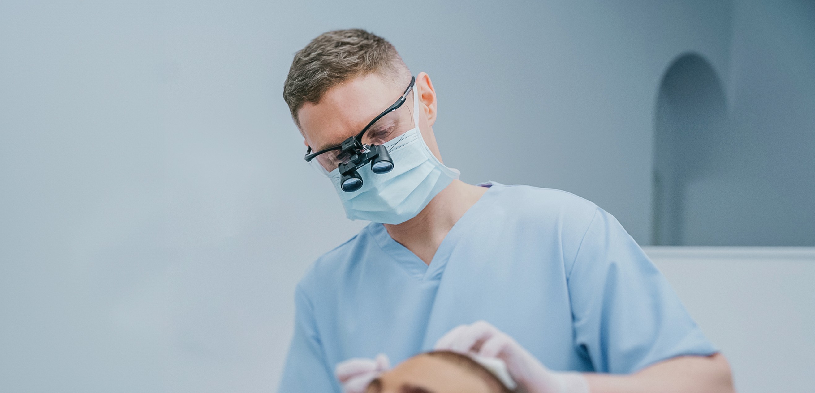 Dr Clarke Performing Hair Transplant Surgery