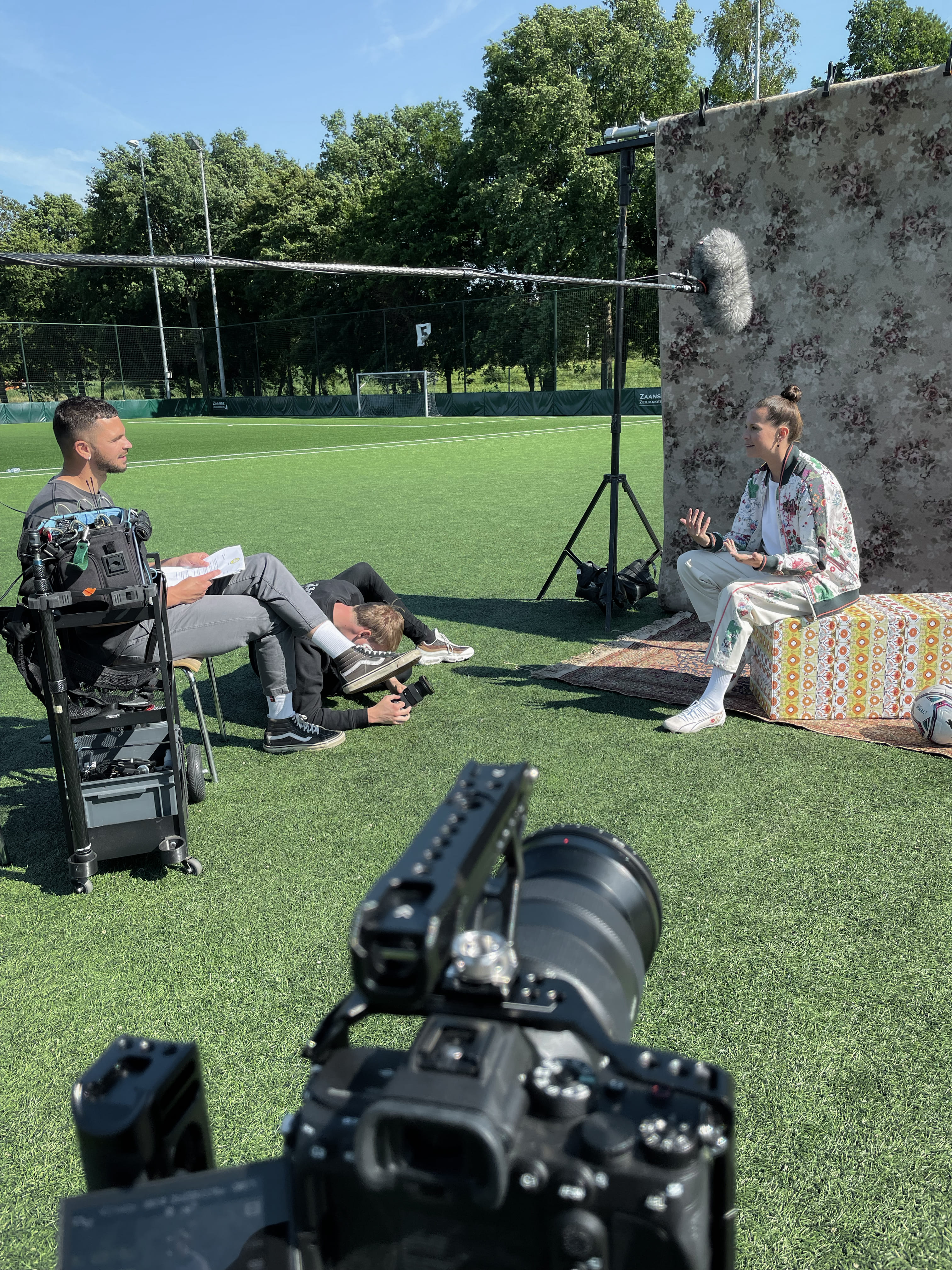 Streetside billboard with flyposters of the Batch.Works brand and illustrations