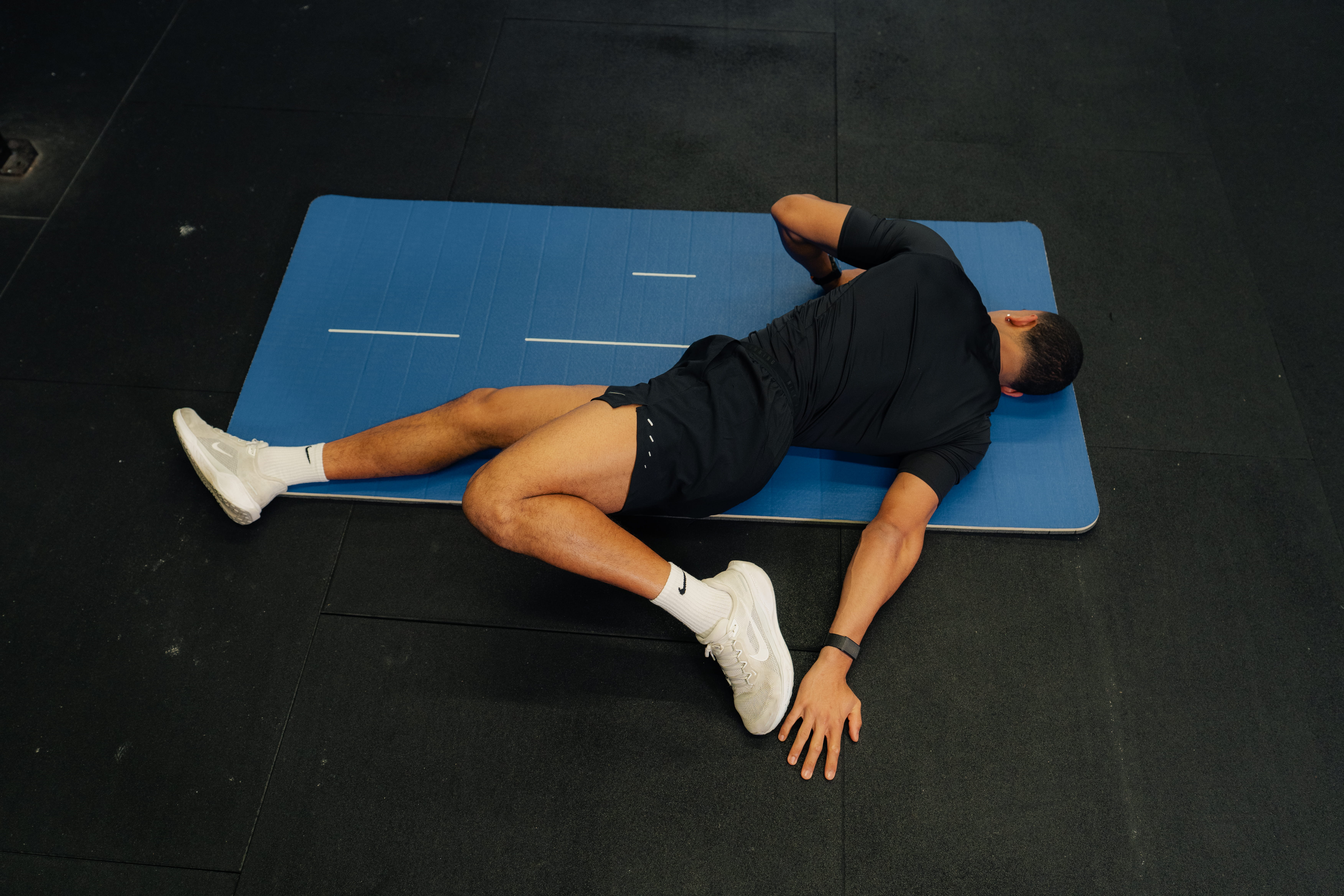 person laying on mat - Ankle Stiffness