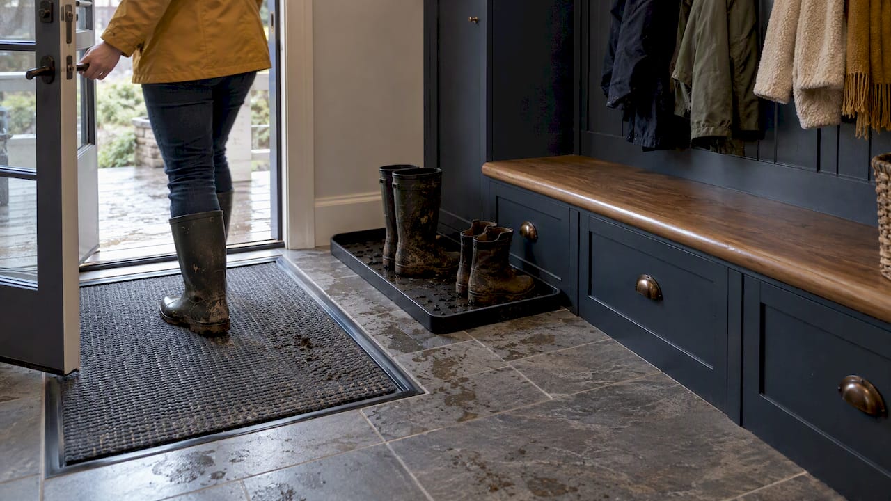 Mudroom boot tray and textured safety flooring