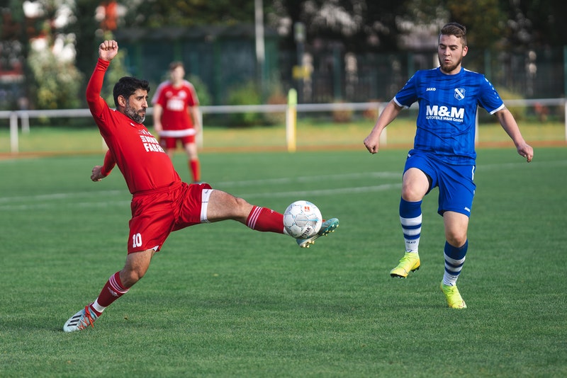 Two soccer players with a ball