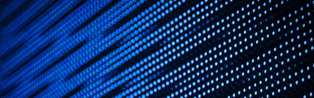 Red digital warning symbol glowing on a circuit board interface, representing active ransomware exploitation of the VMware ESXi CVE 2025 22225 vulnerability and hypervisor compromise.