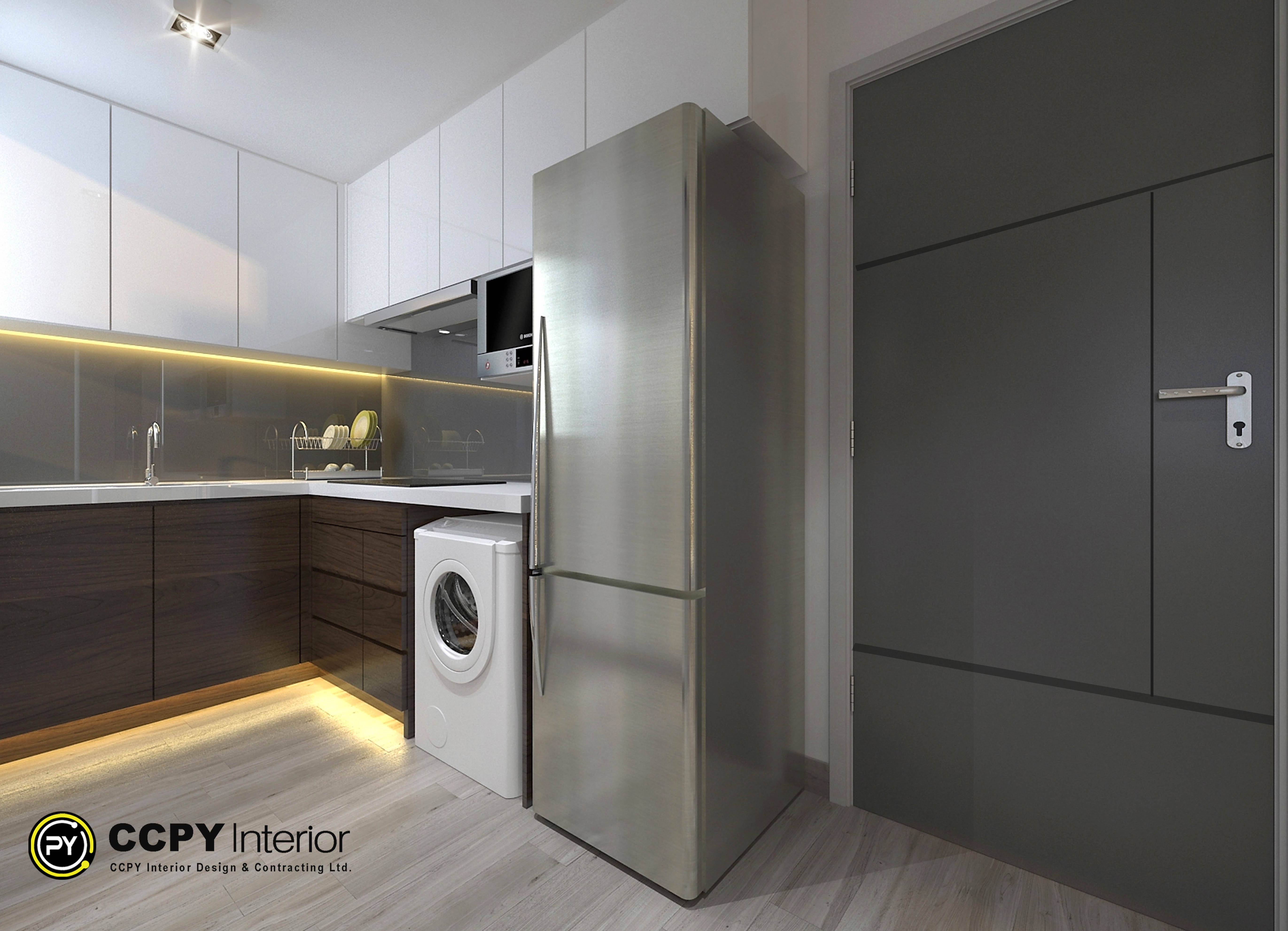 This image shows a modern, space-efficient kitchen and entryway design for a compact apartment.Key Design FeaturesCompact Kitchen Layout: A straight-line (one-wall) kitchen setup maximizing limited square footage.Integrated Appliances: A front-loading washing machine and a tall stainless steel refrigerator are built directly into the cabinetry line.Layered Lighting: Warm LED strip lighting under the upper cabinets and along the kickboards creates depth and a cozy ambiance.Contrast Color Palette: Dark wood lower cabinets contrast against clean white upper cabinets to keep the upper space feeling light and open.Hidden Entryway: A minimalist grey door with a sleek silver handle sits adjacent to the kitchen, maintaining clean architectural lines.