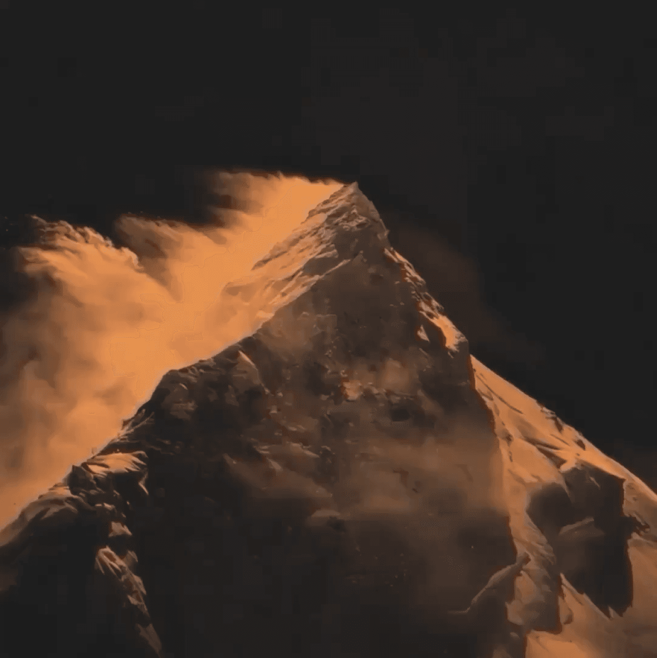 Sunlit mountain peak symbolizing strength, resilience, and global ambition of InstaLimb