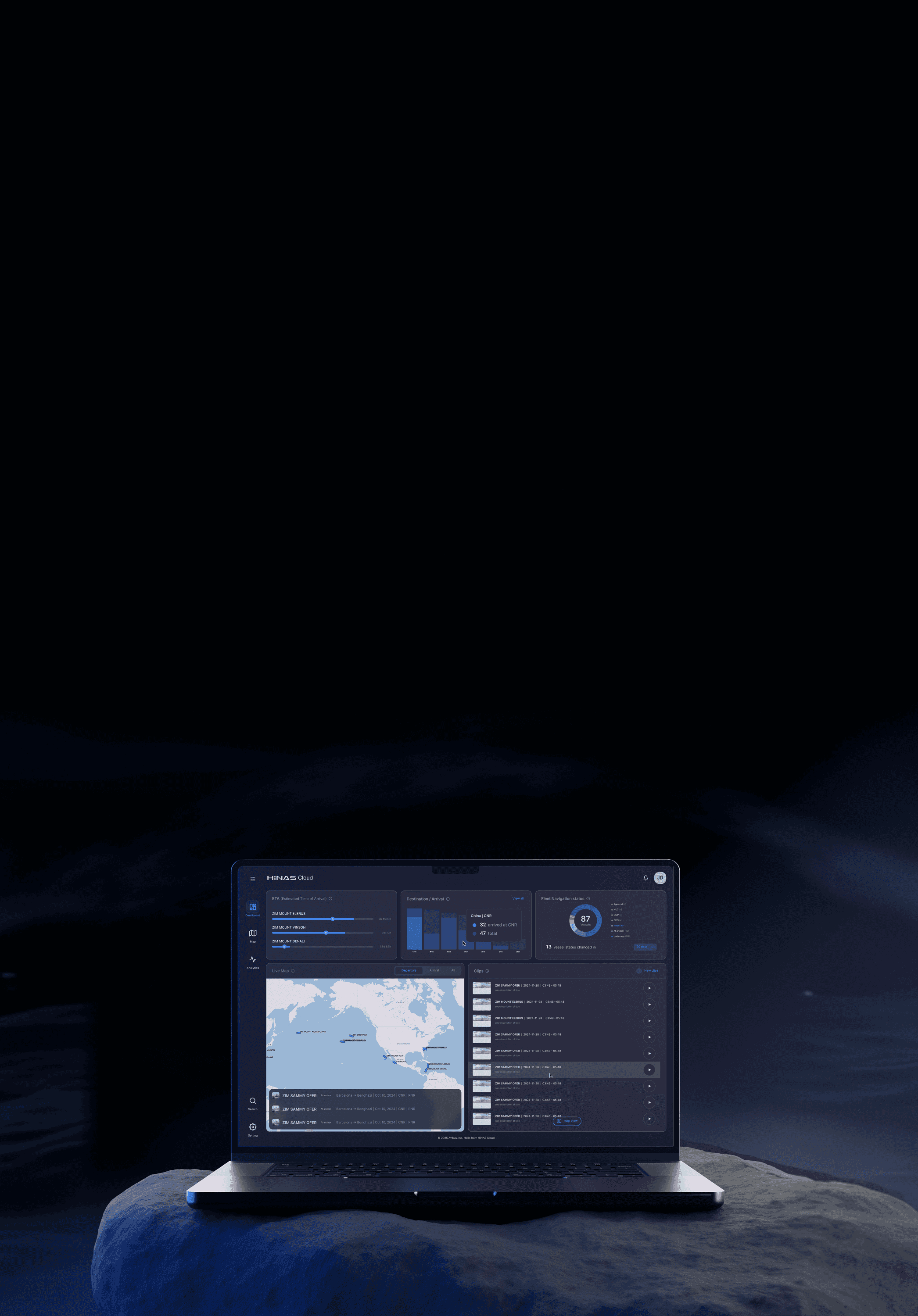 Smiling young woman with long hair standing against a dark green background, holding a finger to her chin.