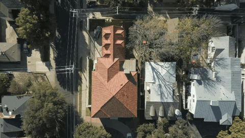 gifs of roof drone shot and front of residential home