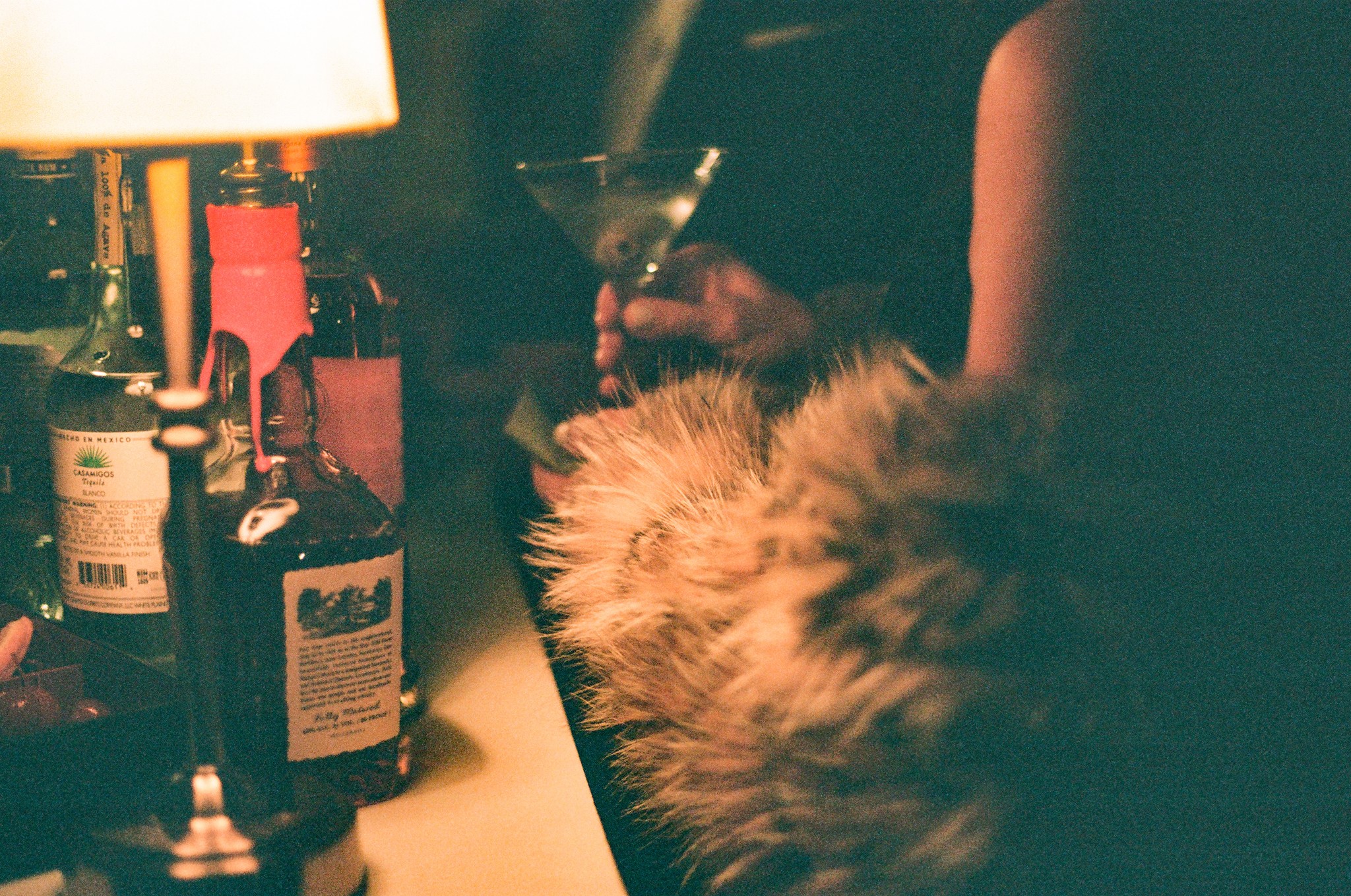    Wedding photographer in South Florida captures a cinematic cocktail hour detail on film with candlelight and editorial wedding styling.
