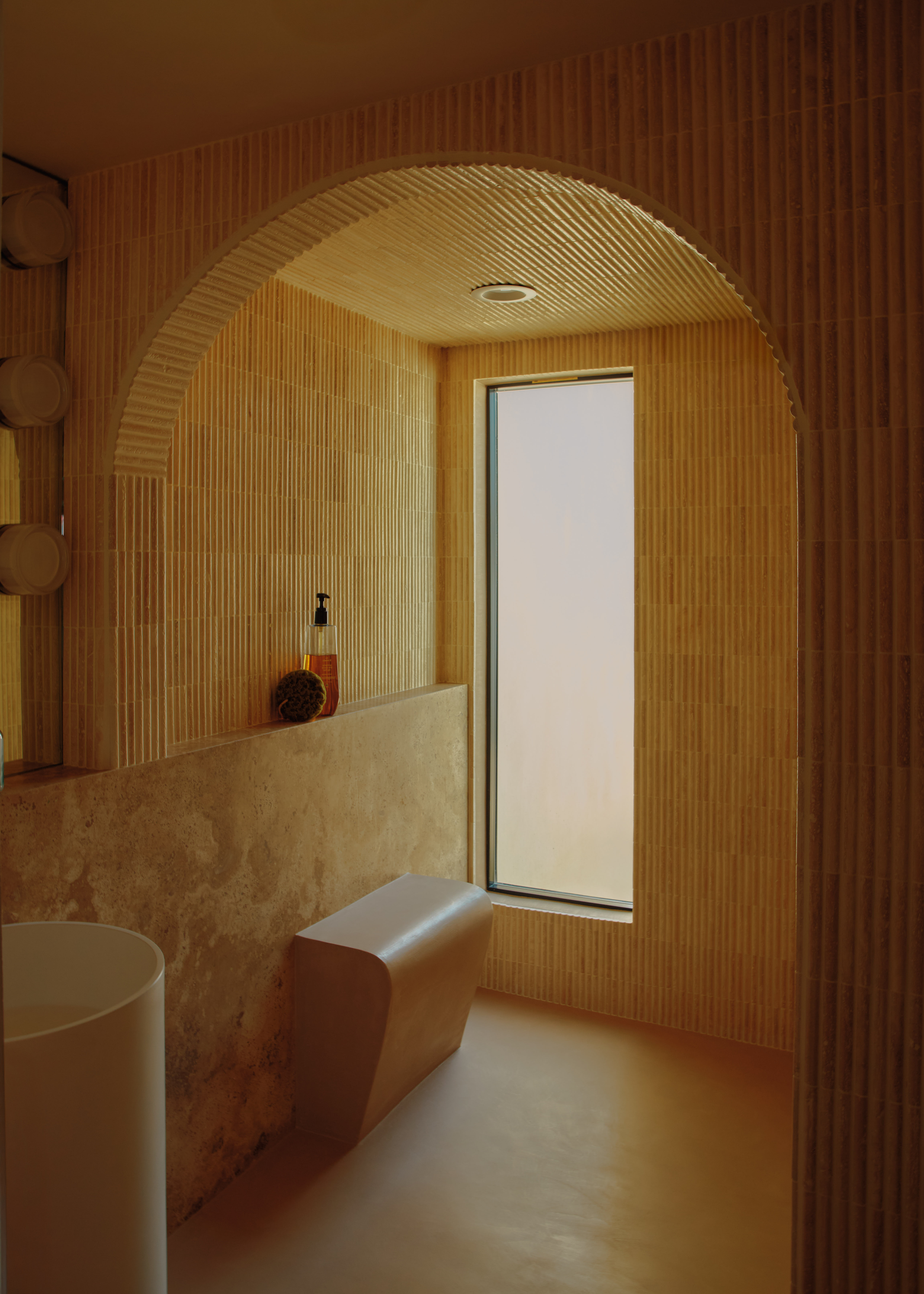 American flag flying against a cloudy sky
