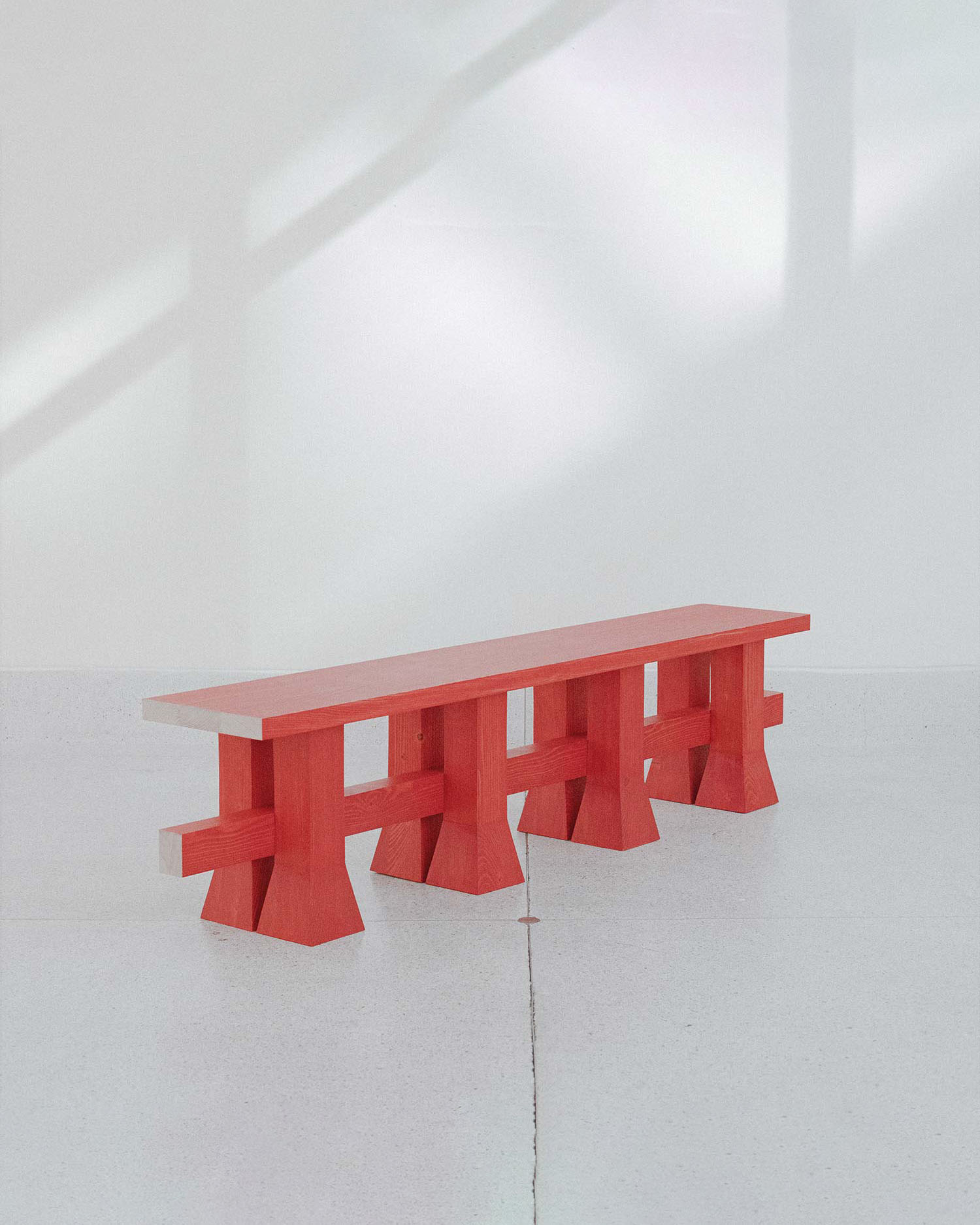 Minimalist Arnaud bench in solid ash wood featuring clean lines and natural finish, designed by Jiří Krejčiřík.