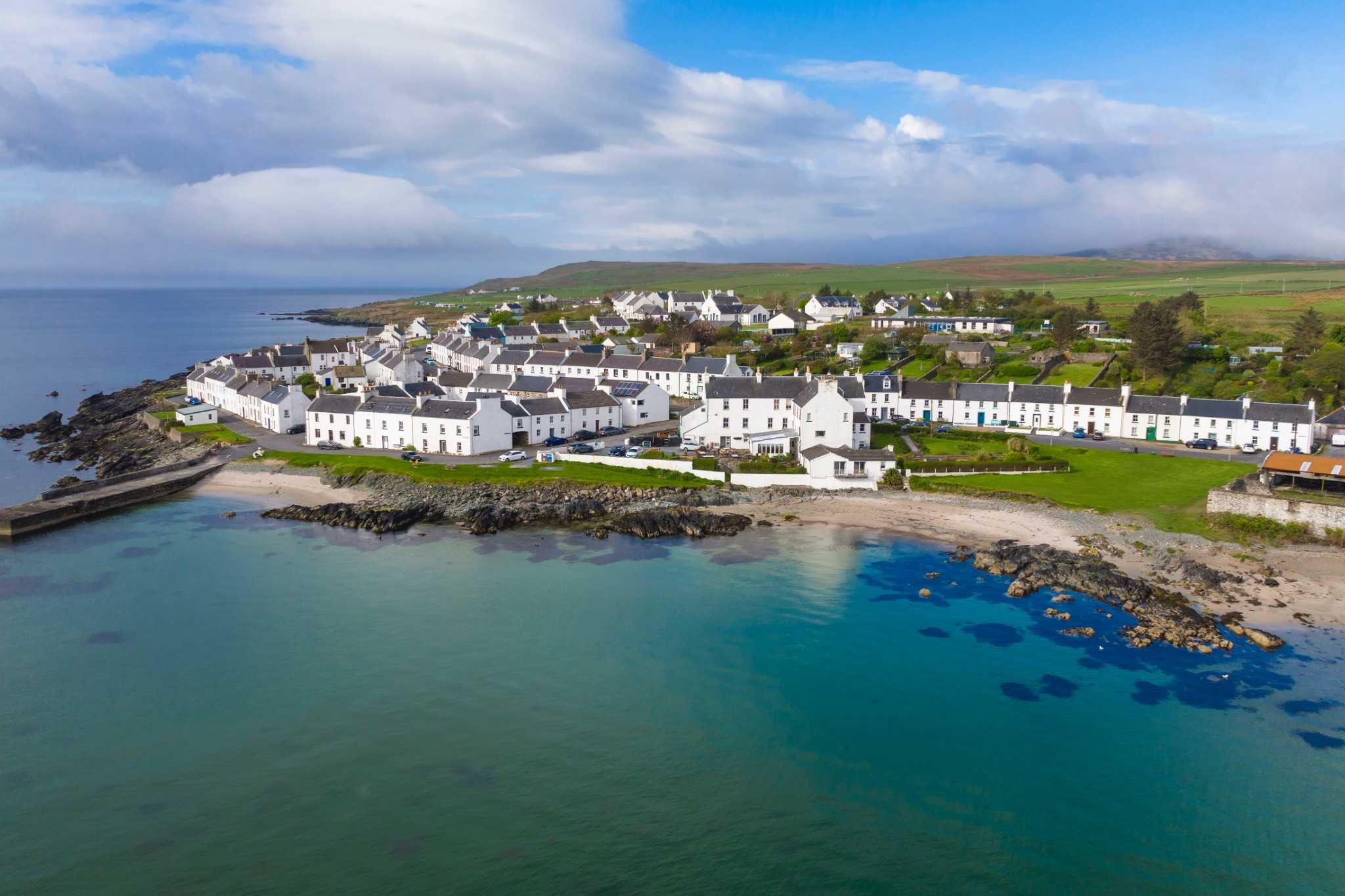 Islay, the scenic Scottish island, is named a top travel destination for 2025 by Vogue UK, boosting whisky tourism.