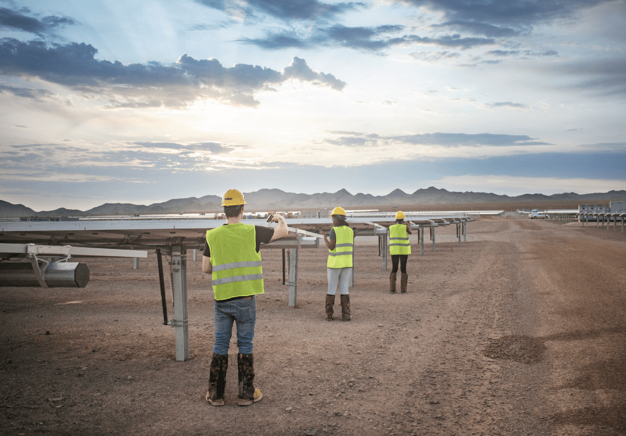 “Solar staff scanning and logging PV module serial numbers in the field.”