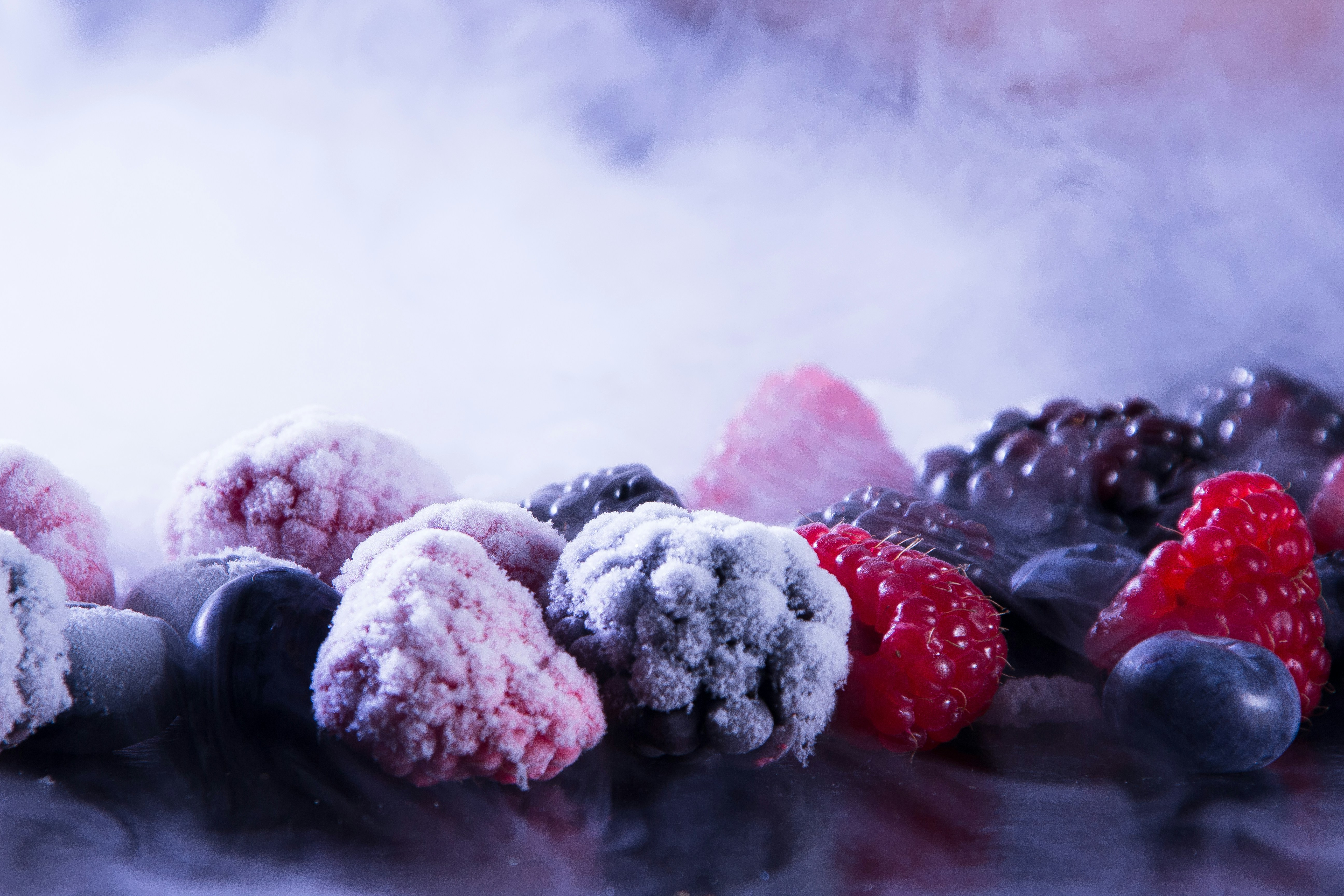 Selection of frozen mixed berries, perfect for smoothies and desserts, available in the frozen section at International Food Market Orlando on Goldenrod Road.