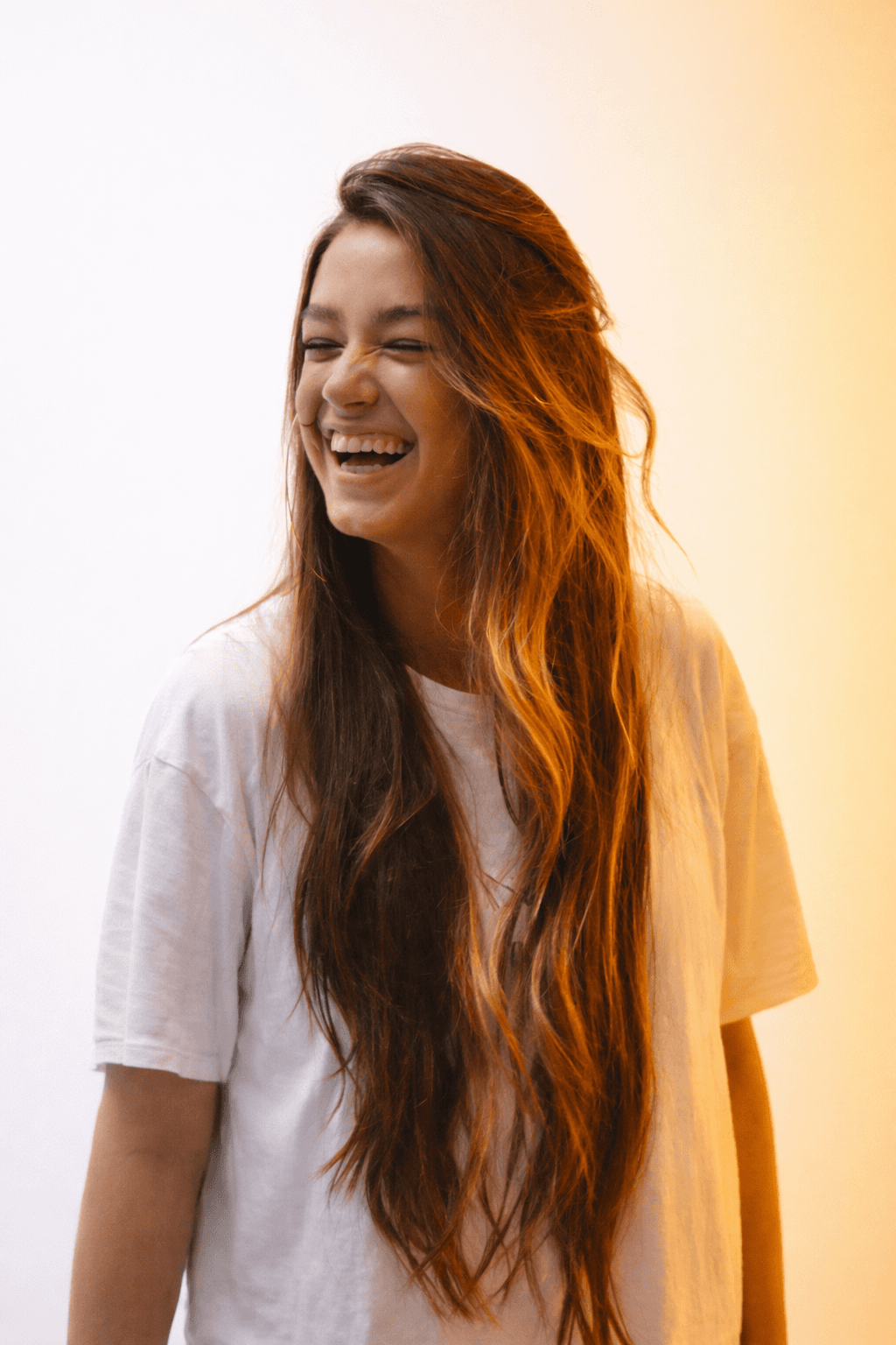 people sitting near table with laptop computer