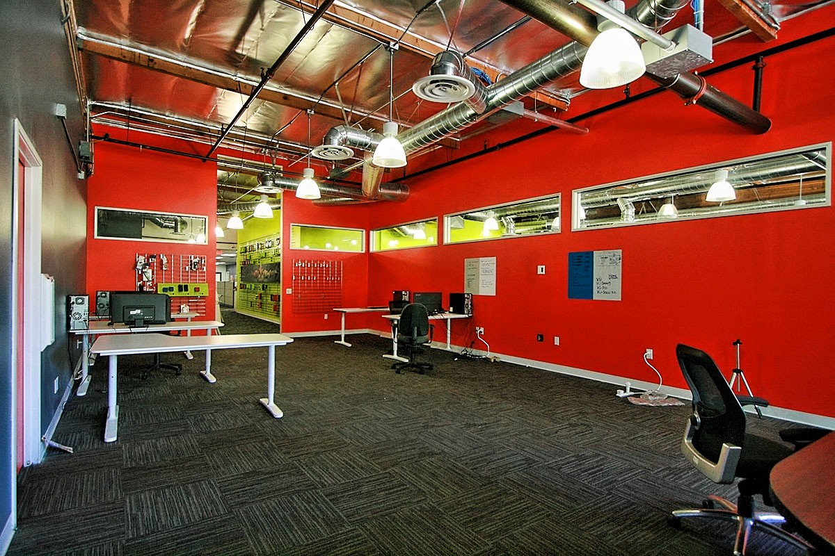 Red office room featuring a bold color scheme for a dynamic workspace.