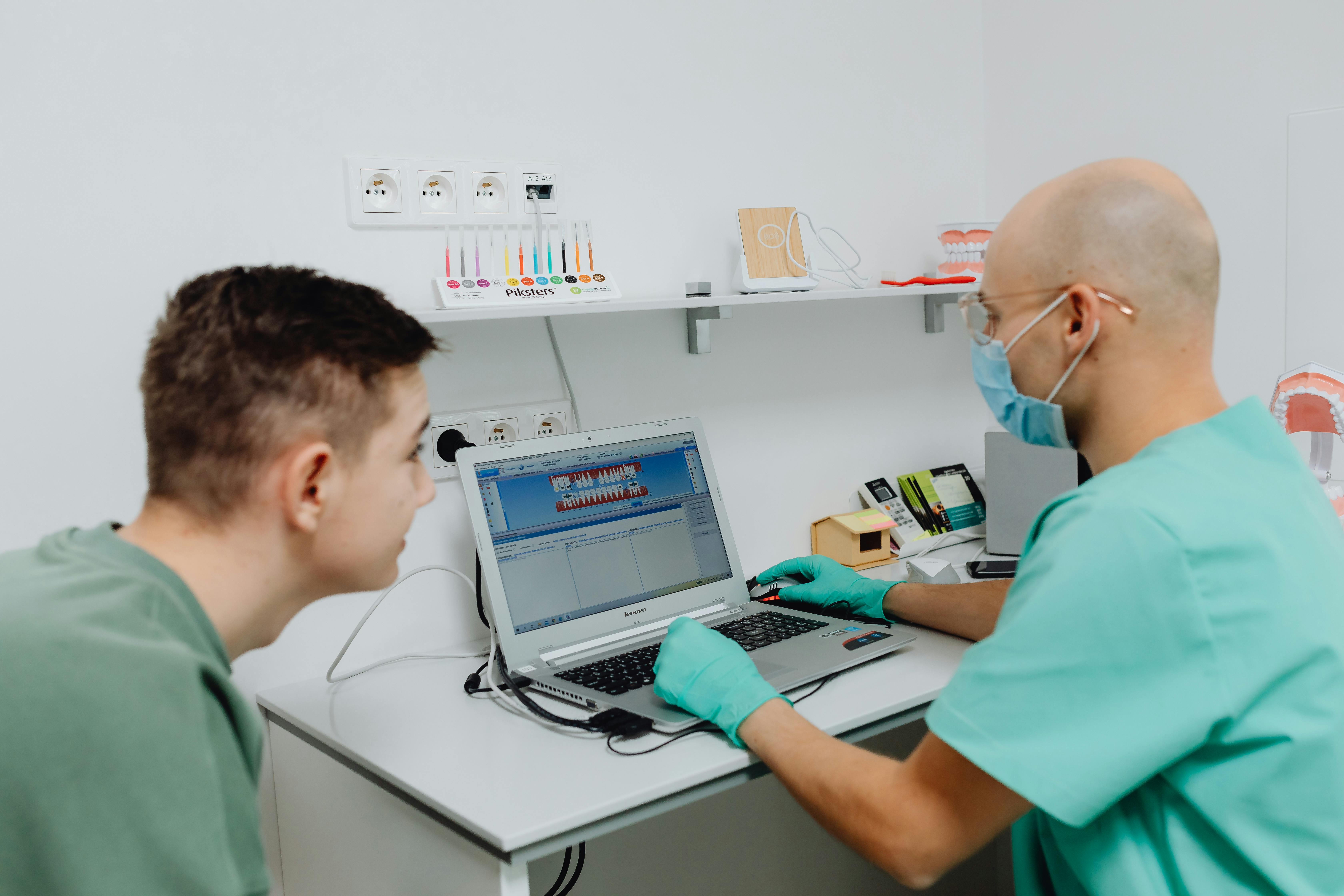 dental hygienist on laptop