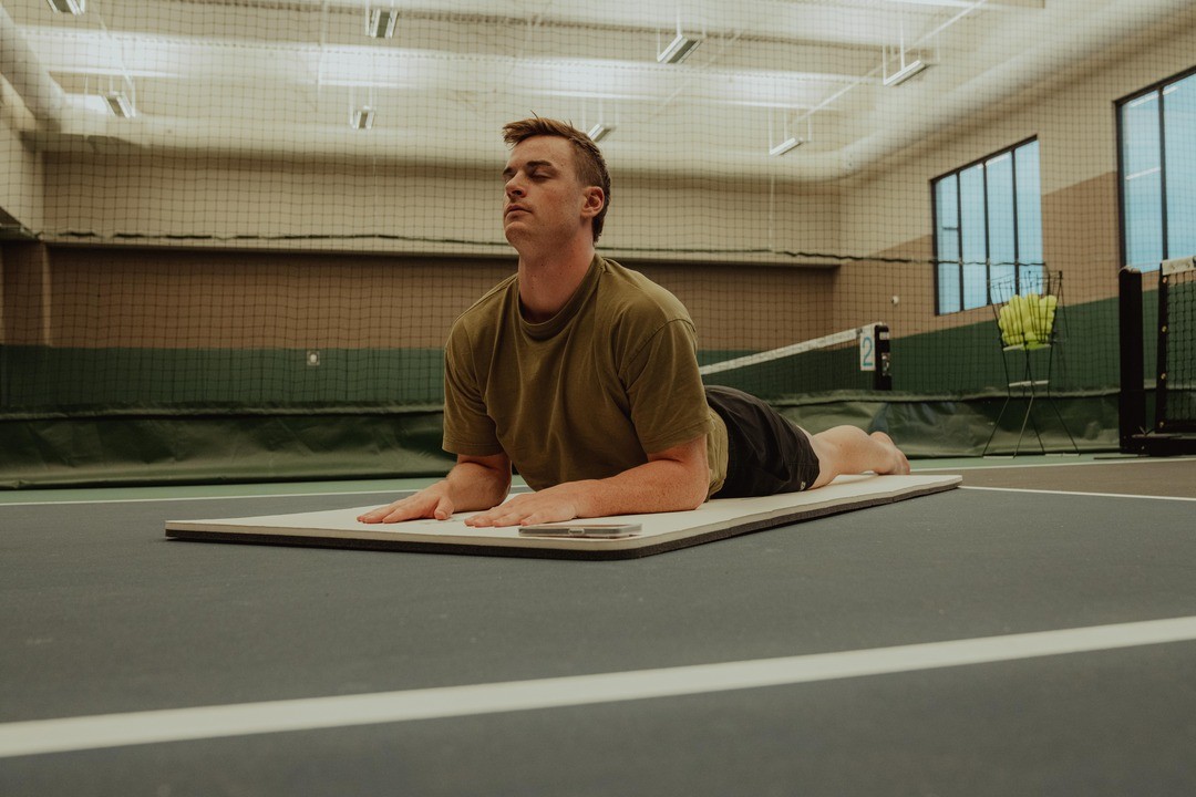 person laying down - Rib Mobility Exercises