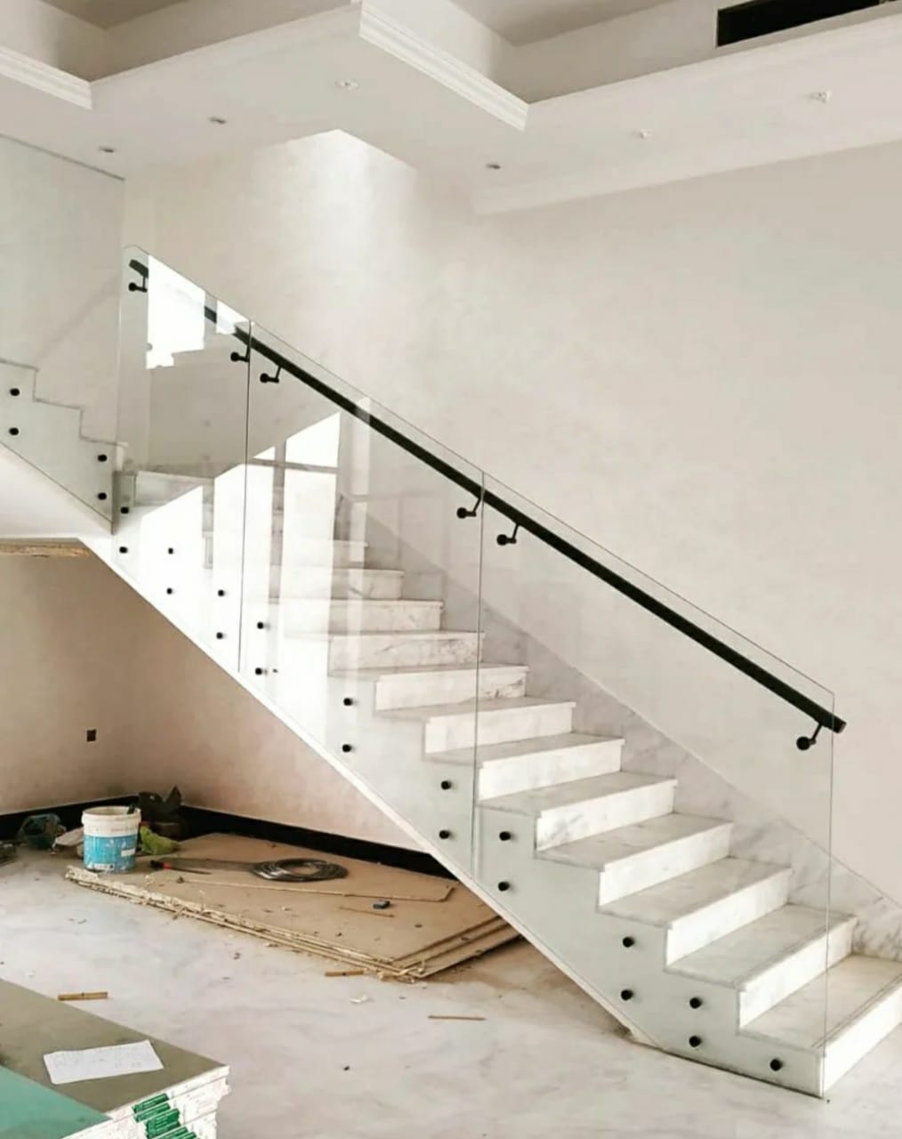 person writing on a piece of paper