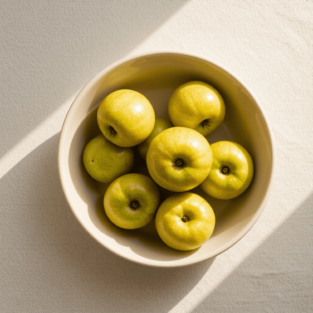 product photography of bowl of green apples