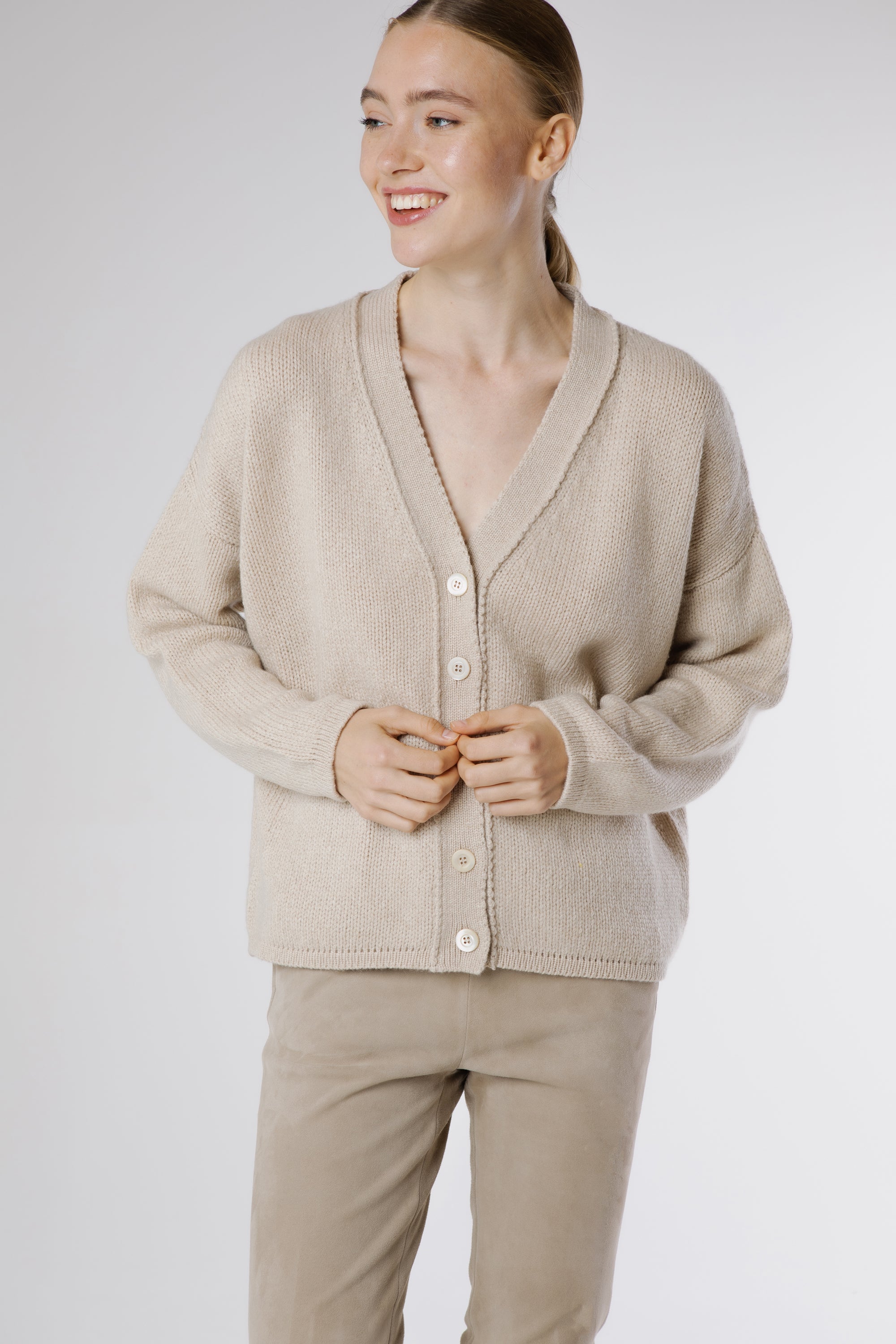 Front view of Erro Cashmere Cardigan Sphinx in warm beige Italian cashmere with relaxed fit and V-neckline.
