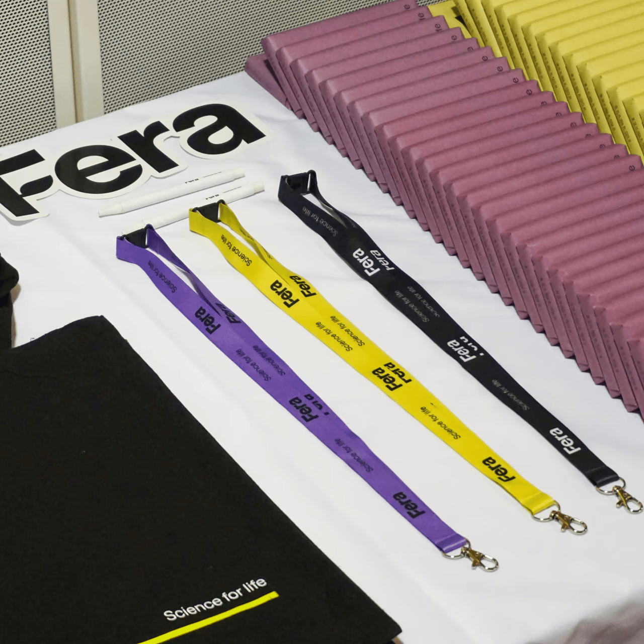 Fera roller banner beside a conference table