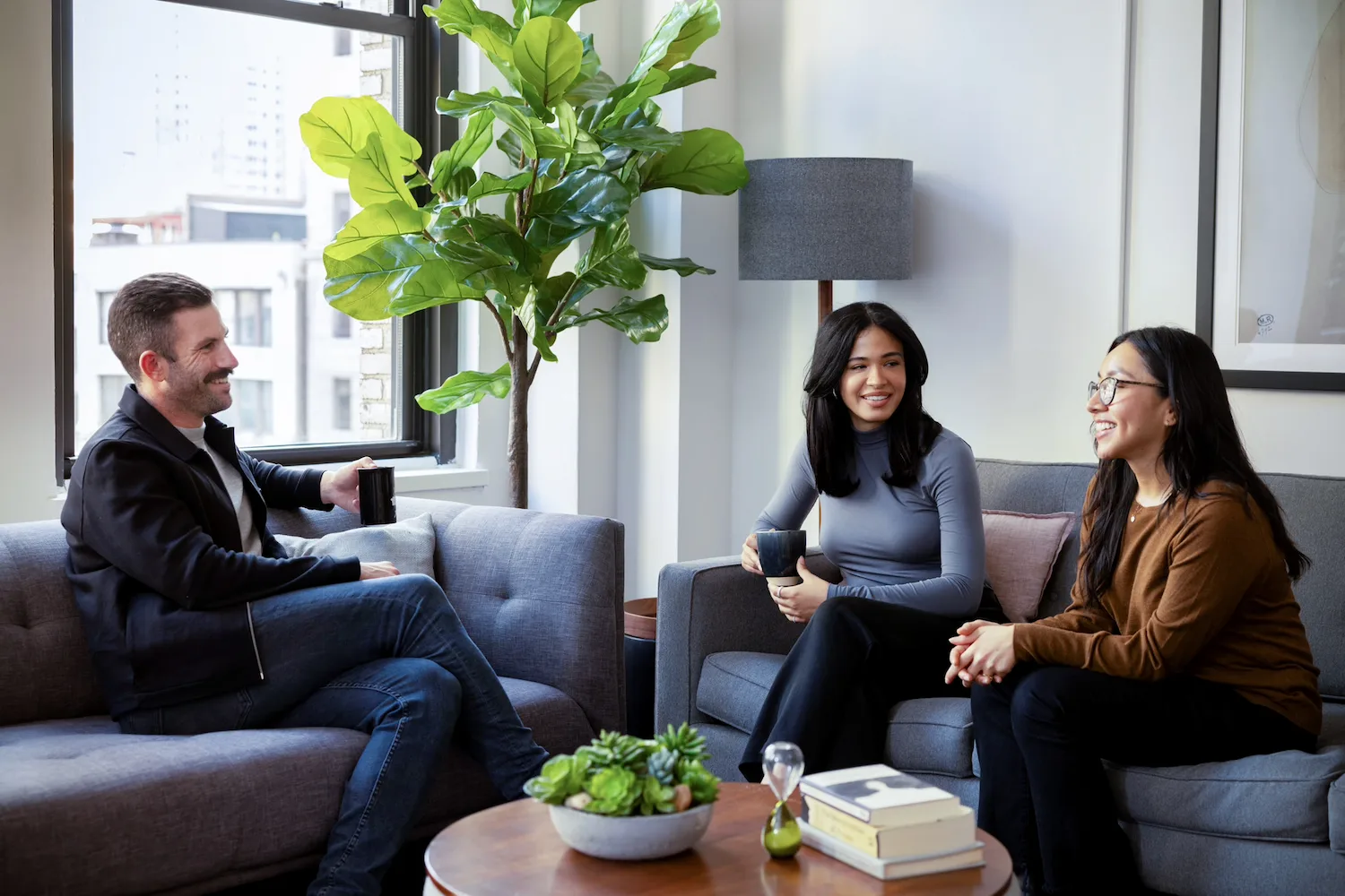 Online therapy session in New York with diverse individuals sharing support in a comfortable setting