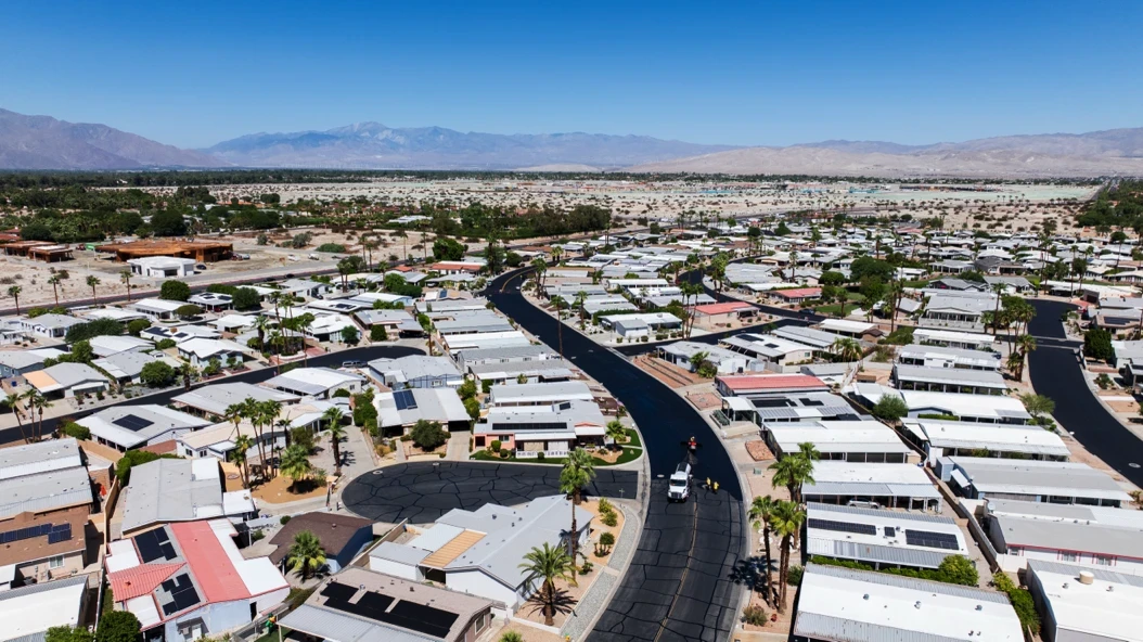Aerial shot of large apartment complex asphalt paving project