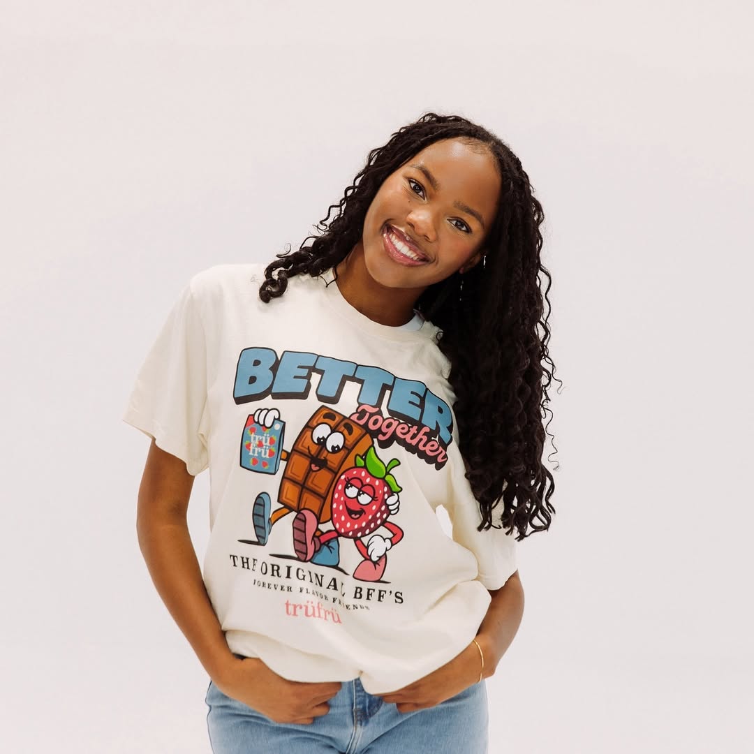 An image of a woman modeling the TruFru better together T-shirt. 