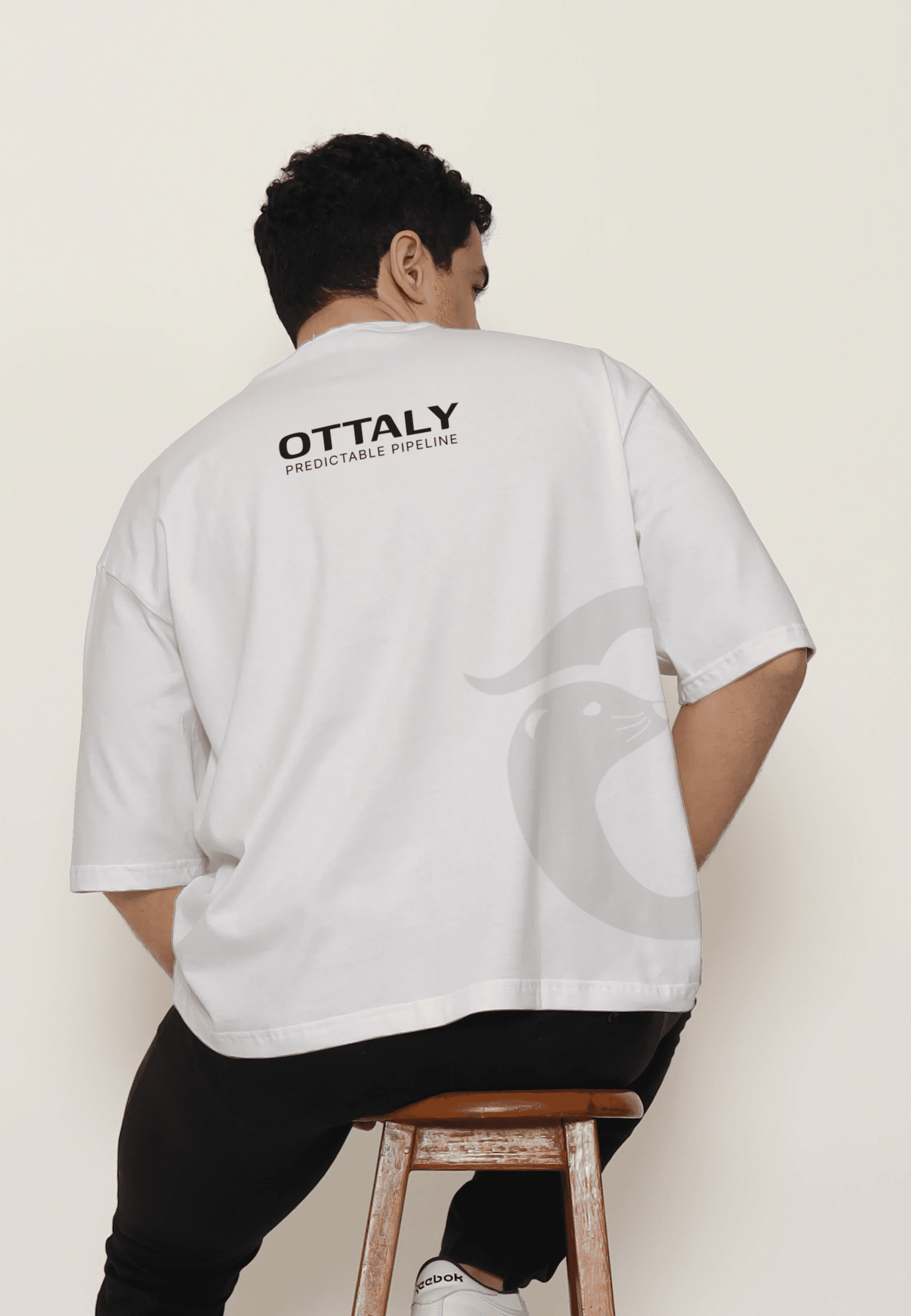 A vertical billboard mockup on a weathered, industrial-style building facade. The minimalist poster features a black background with the white sans-serif text "Systematic FRAMEWORK." Centered is a framed architectural photograph of a modern staircase with a lone figure, and the "Brand Frame" logo is positioned in the bottom-left corner.