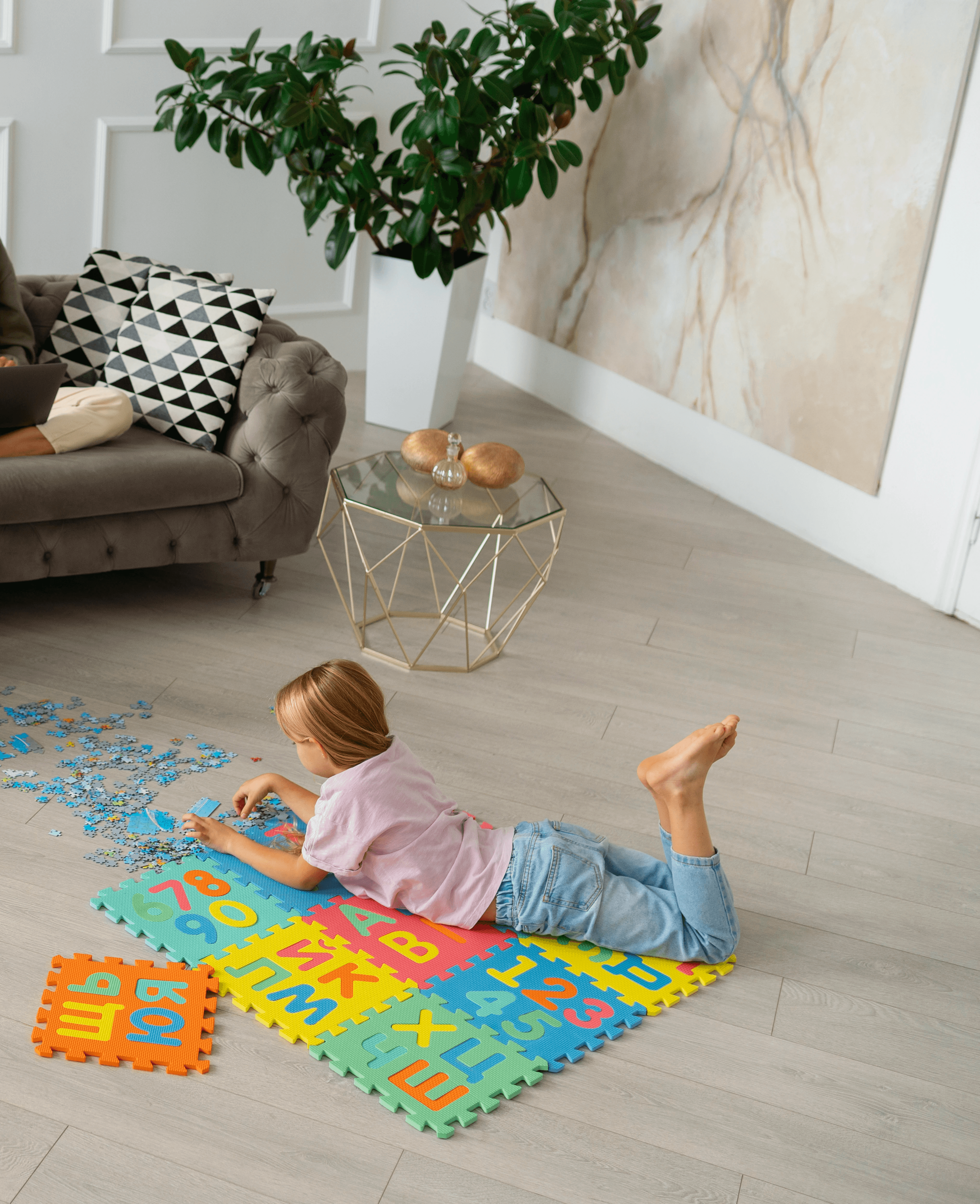 Family spending a relaxed afternoon on hybrid flooring that’s water-resistant, easy to clean, and slip-friendly for everyday life in Brisbane, Queensland.