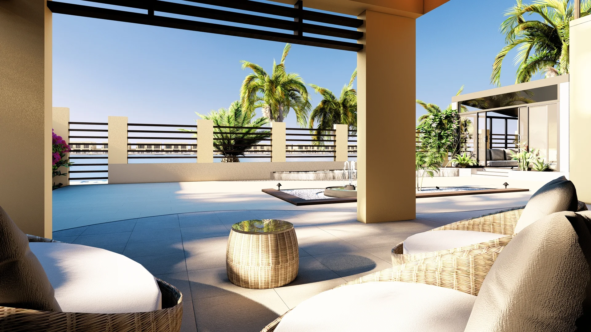 A luxurious backyard area in a sunny setting. There are several comfortable-looking seating areas featuring padded lounge chairs and sofas, arranged on a clean, tiled floor. Lush green palm trees add a tropical vibe to the space.