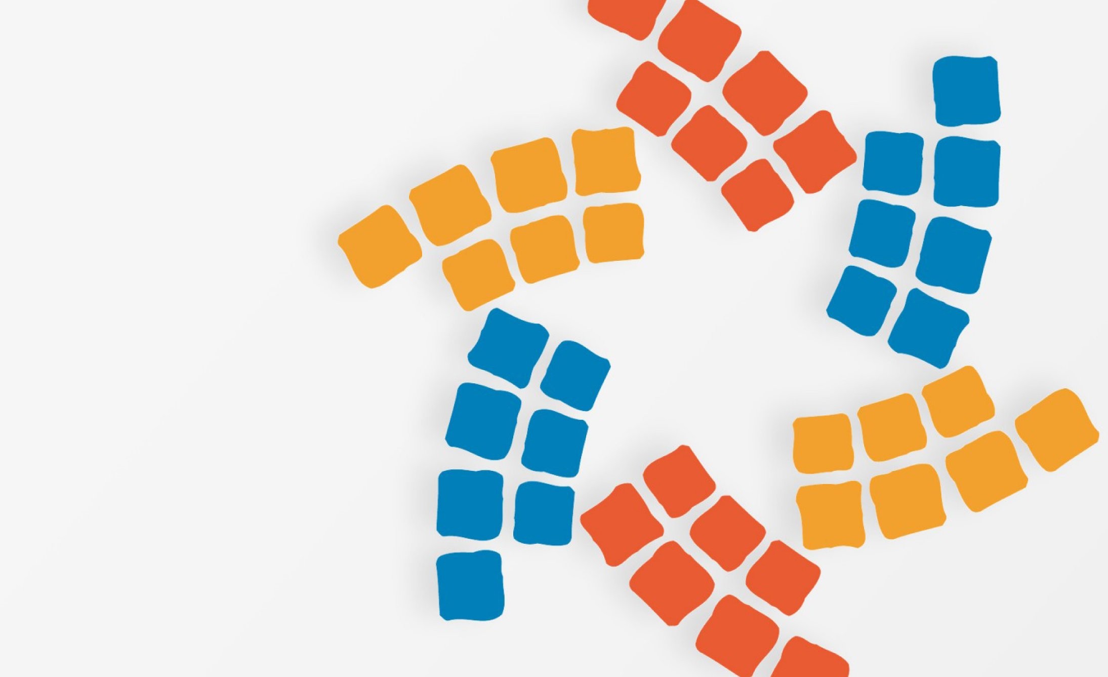 A vibrant abstract pattern features colorful tiles in blue, orange, and red, arranged in pinwheel shapes. The design conveys a sense of motion and energy.