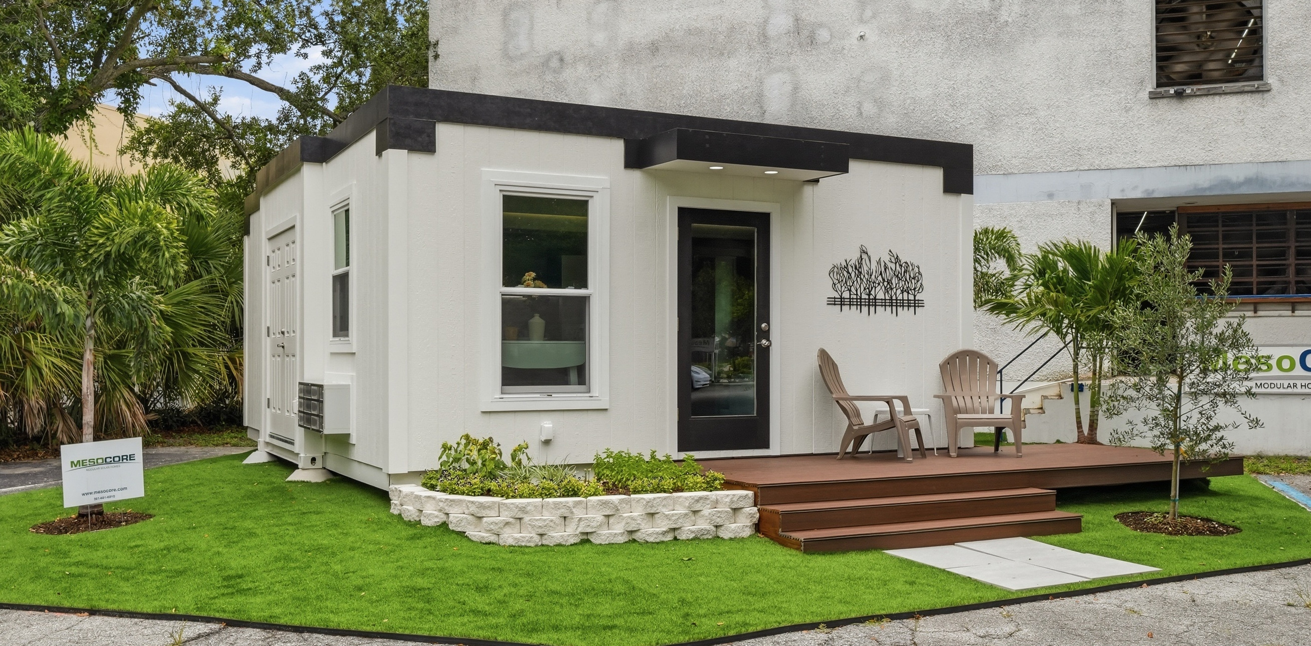 A high-quality exterior view of a permanent structural steel Mesocore home, highlighting the difference between appreciating modular builds and manufactured homes