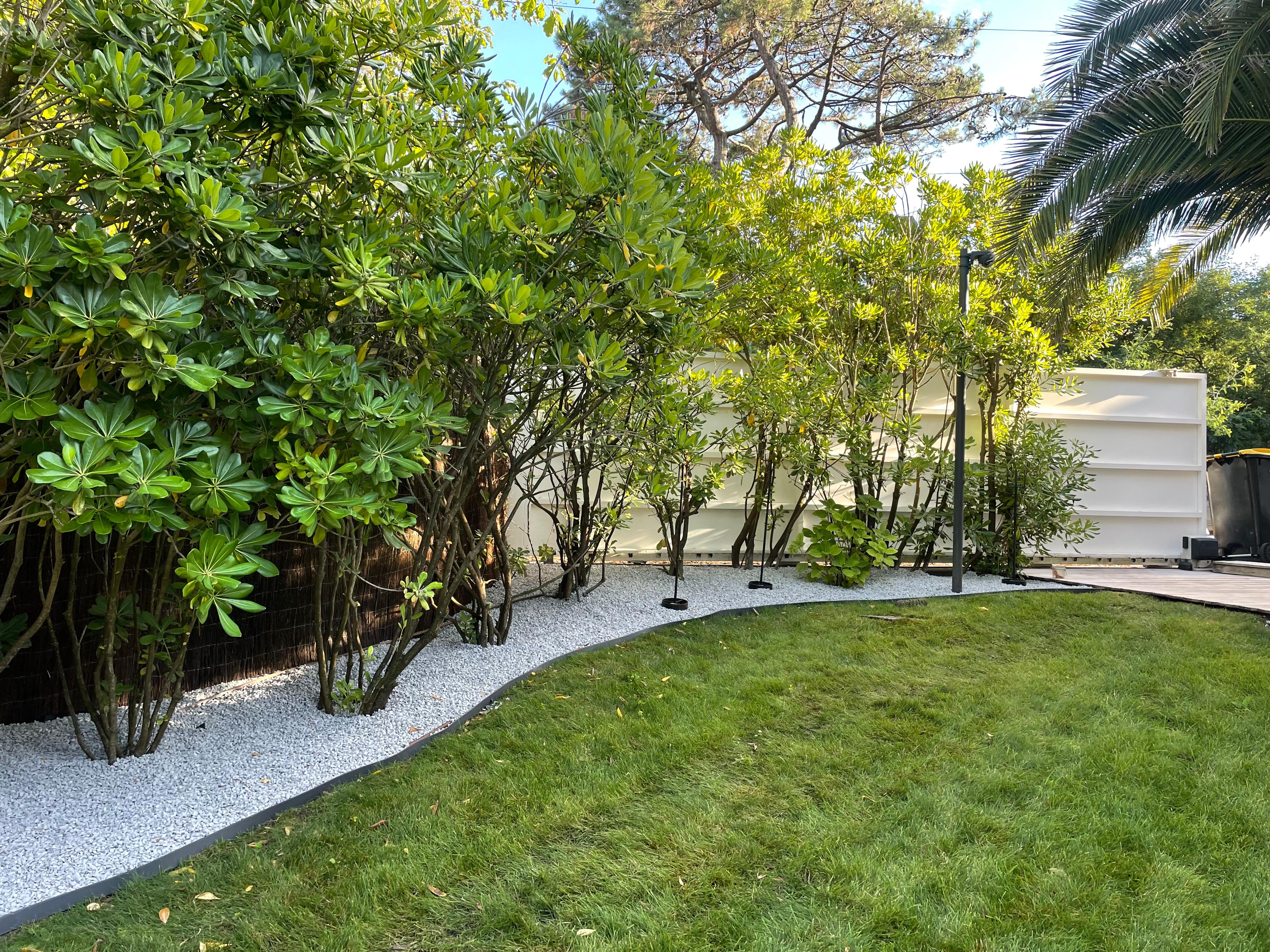 Beautiful landscaped garden with greenery and outdoor design elements.