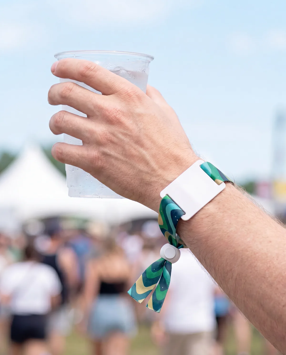 RFID fabric wristband worn at an outdoor festival