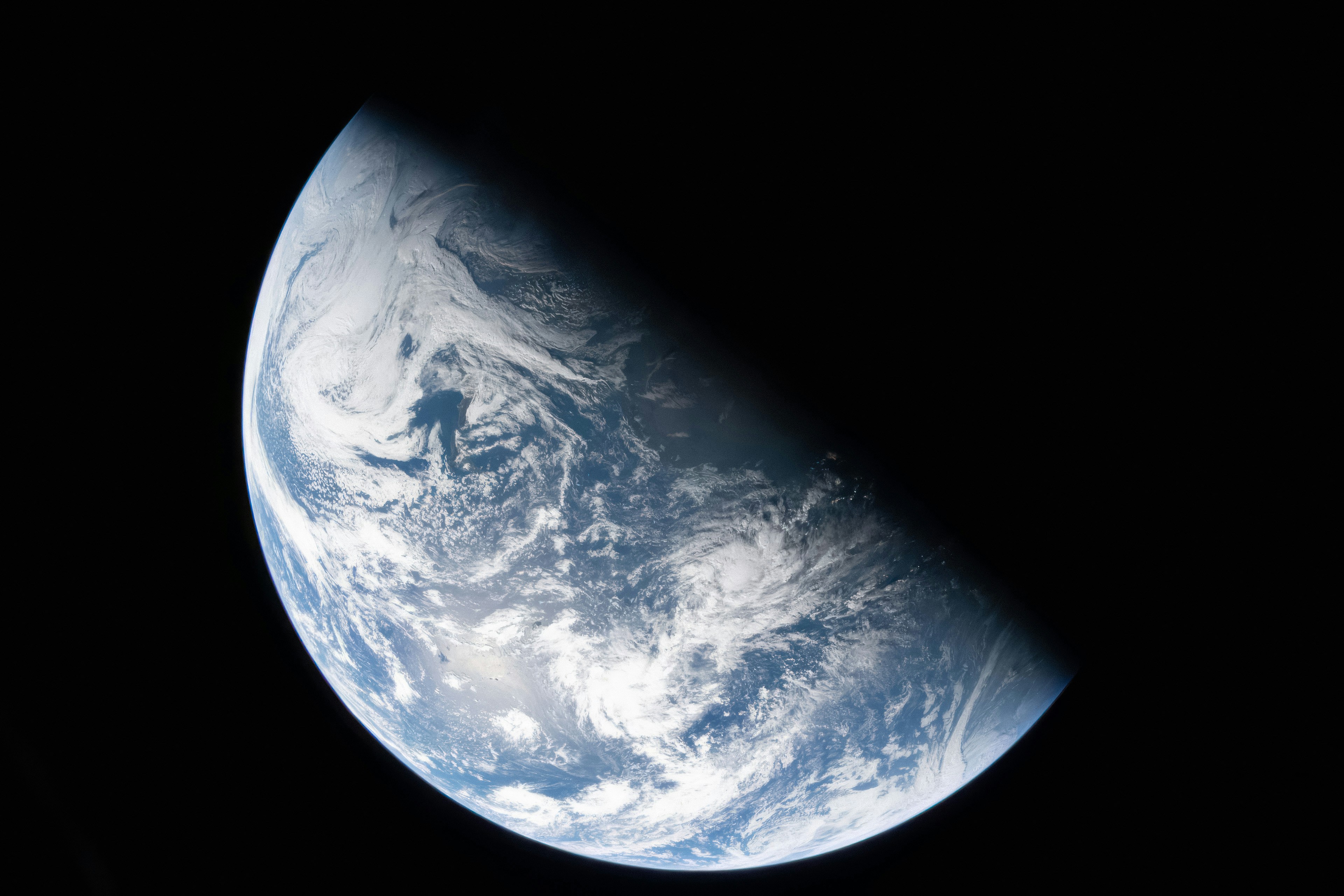 View of earth from space with clouds