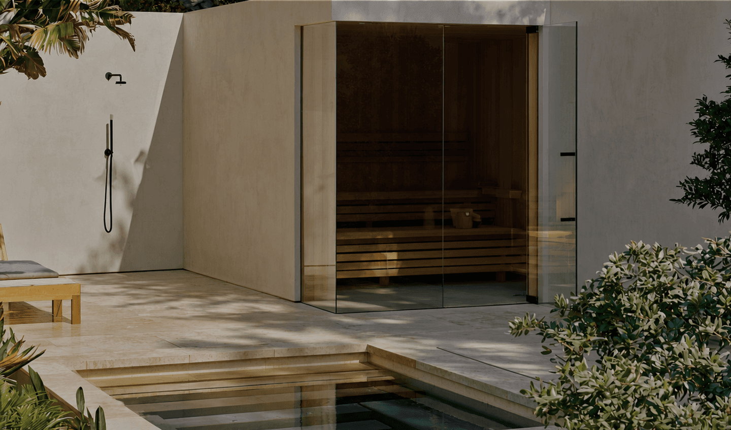 Outdoor wellness environment with a glass-enclosed sauna, outdoor shower and pool