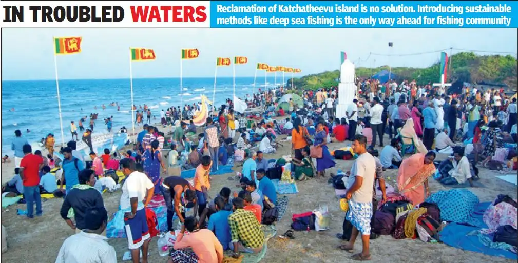 Large gathering of people on Katchatheevu Island beach with Sri Lankan flags, highlighting fishing community challenges and call for sustainable deep-sea fishing.