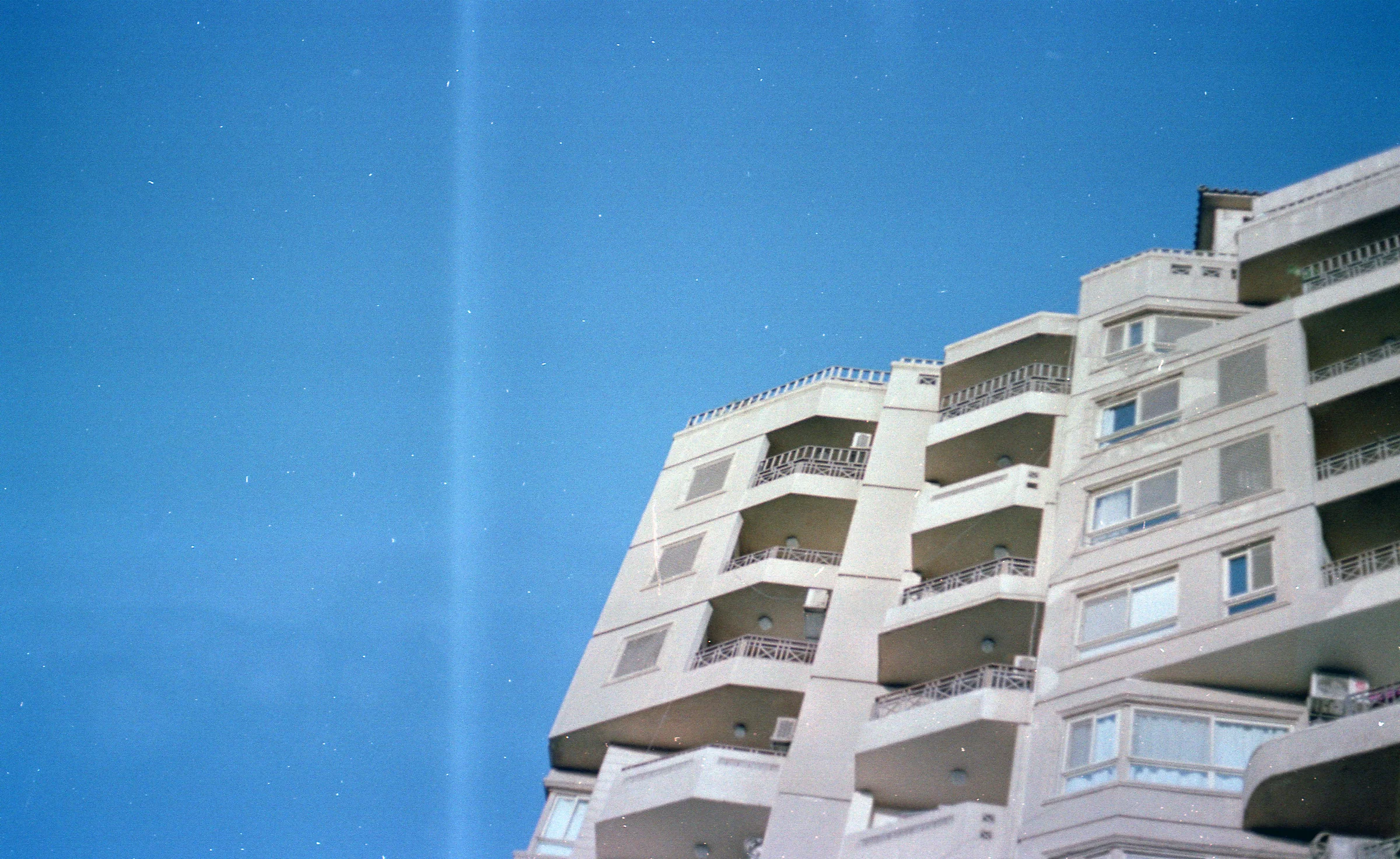 White Balconies Against Blue