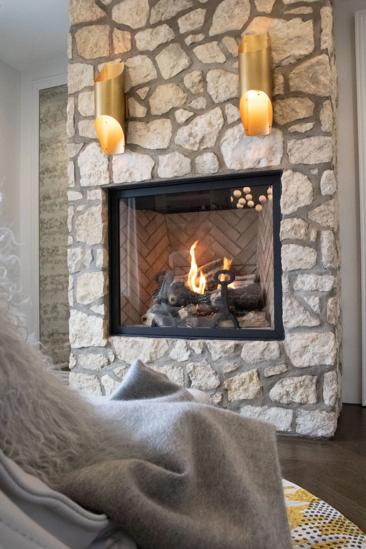 Image of rough stone fireplace.