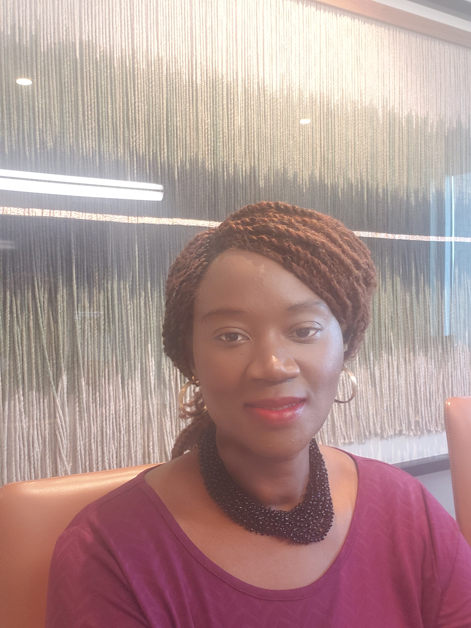 tilt shift lens photography of man standing beside trees