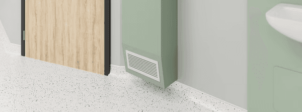 Low-level healthcare ventilation with fire-rated hygidoor in the background