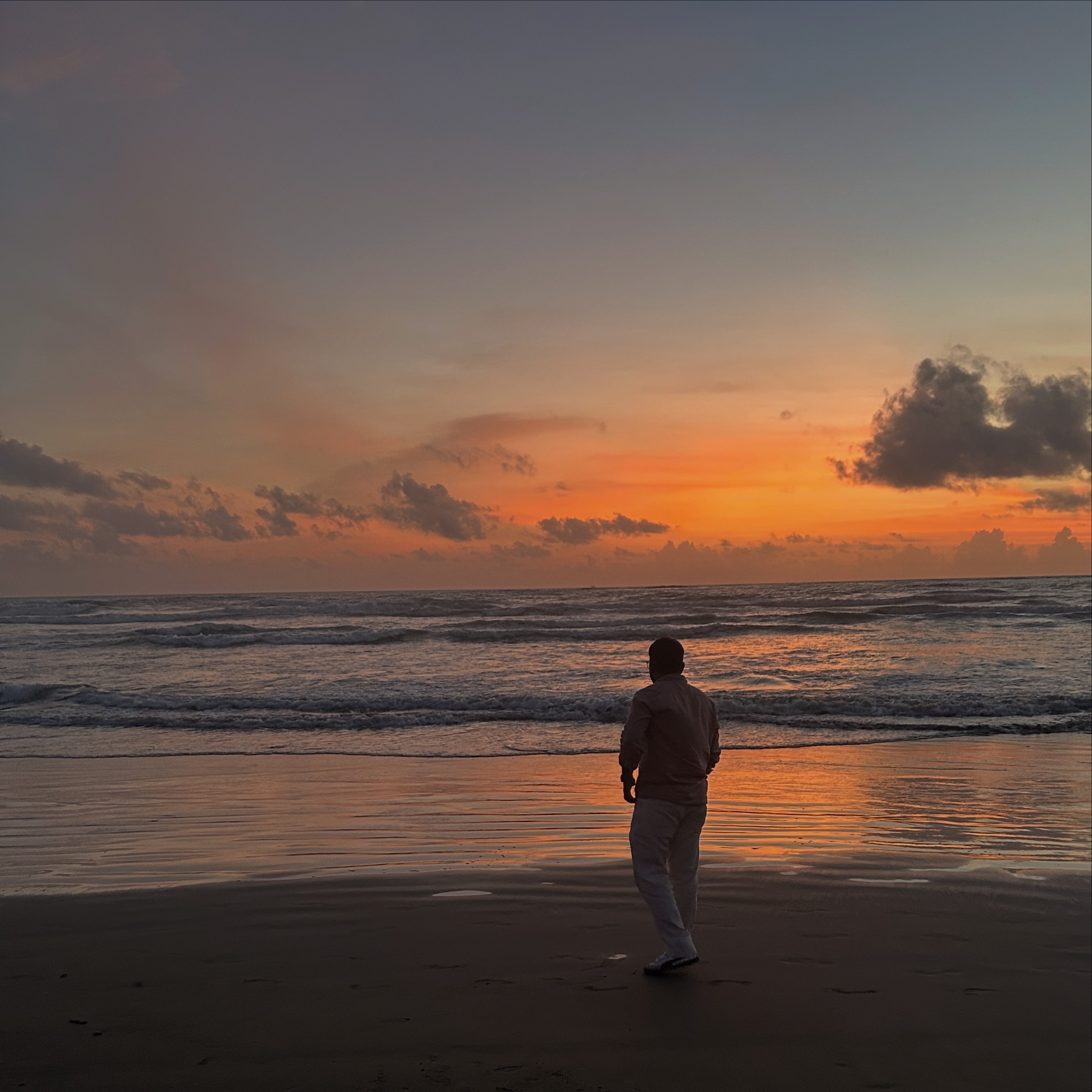A photo of me on the beach.