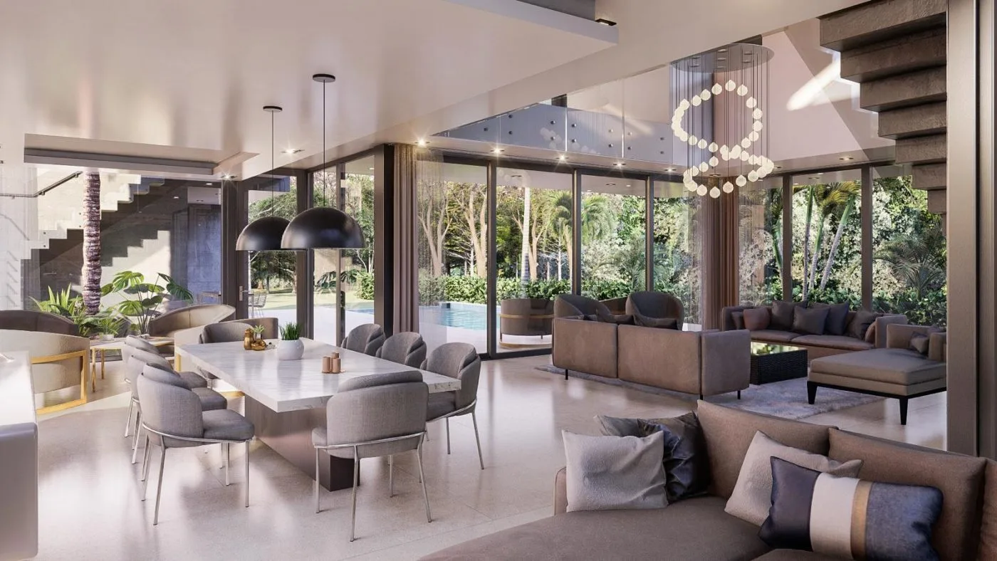 Double-height dining and living room with pool views, modern residential architecture Miami Beach