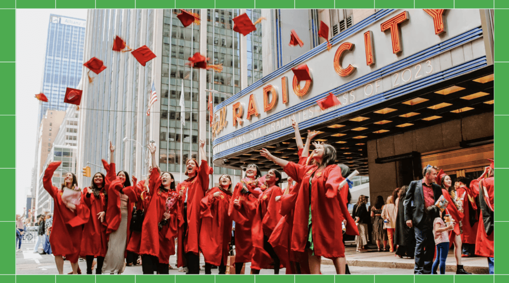 students throwing graduation caps in the air