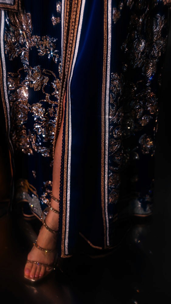 Black Moroccan caftan with gold hand embroidery, elegant handcrafted couture piece prepared in Bahrain