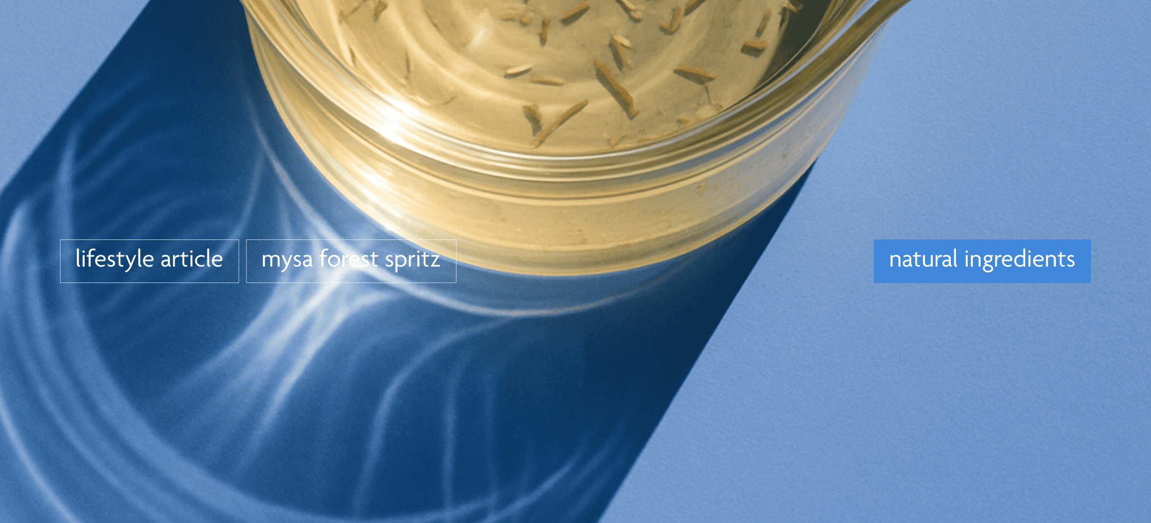 glass of mysa aperitivo liquid shadow shining through the glass in the sun