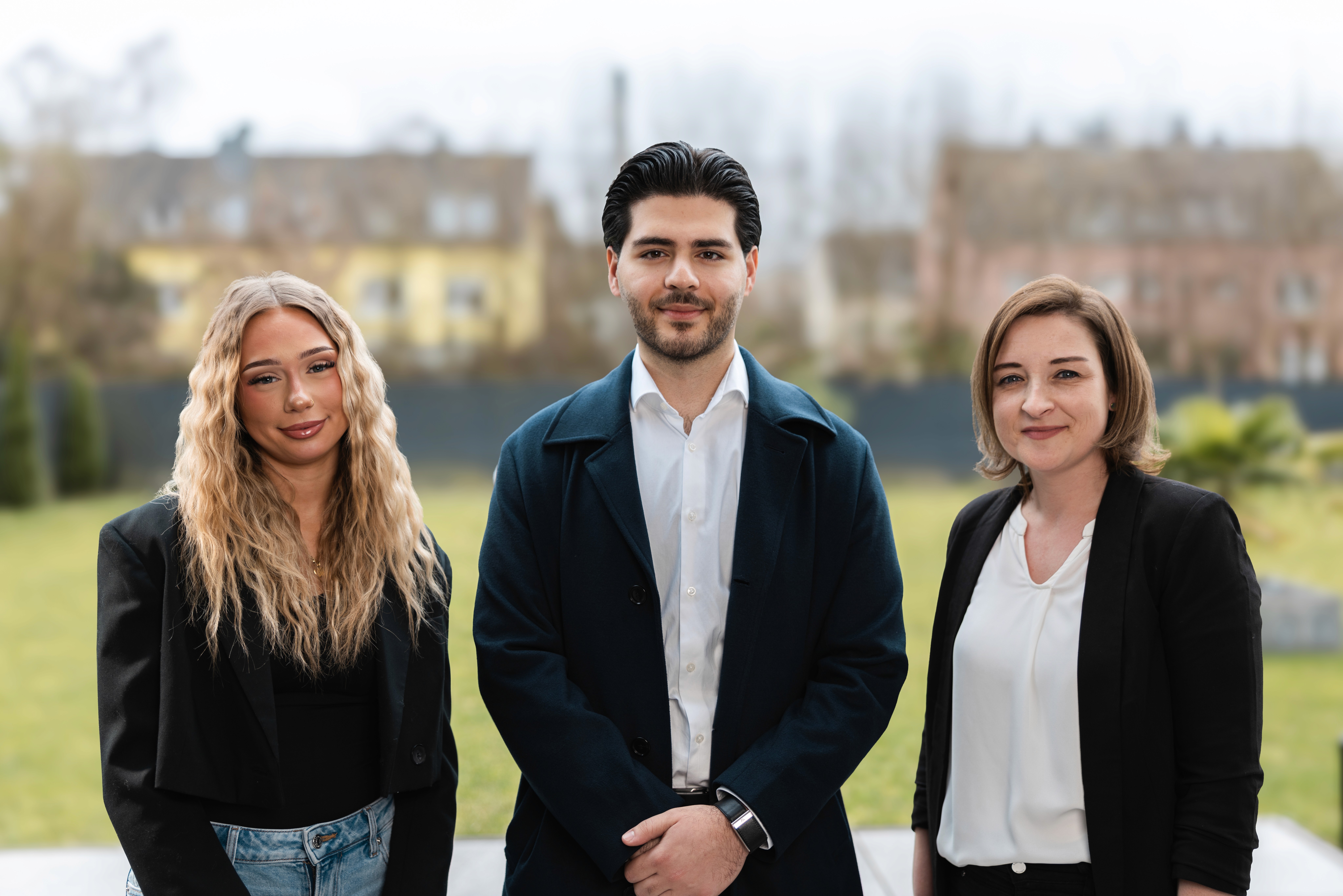 Blurred portrait of a person in an orange patterned shirt with glowing glasses, creating a futuristic and artistic vibe.