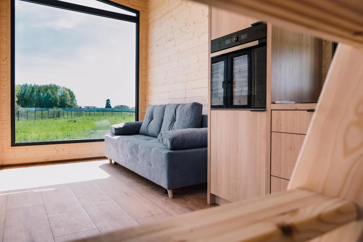 Taunas Living Room With Large window- Berghaus Tiny house