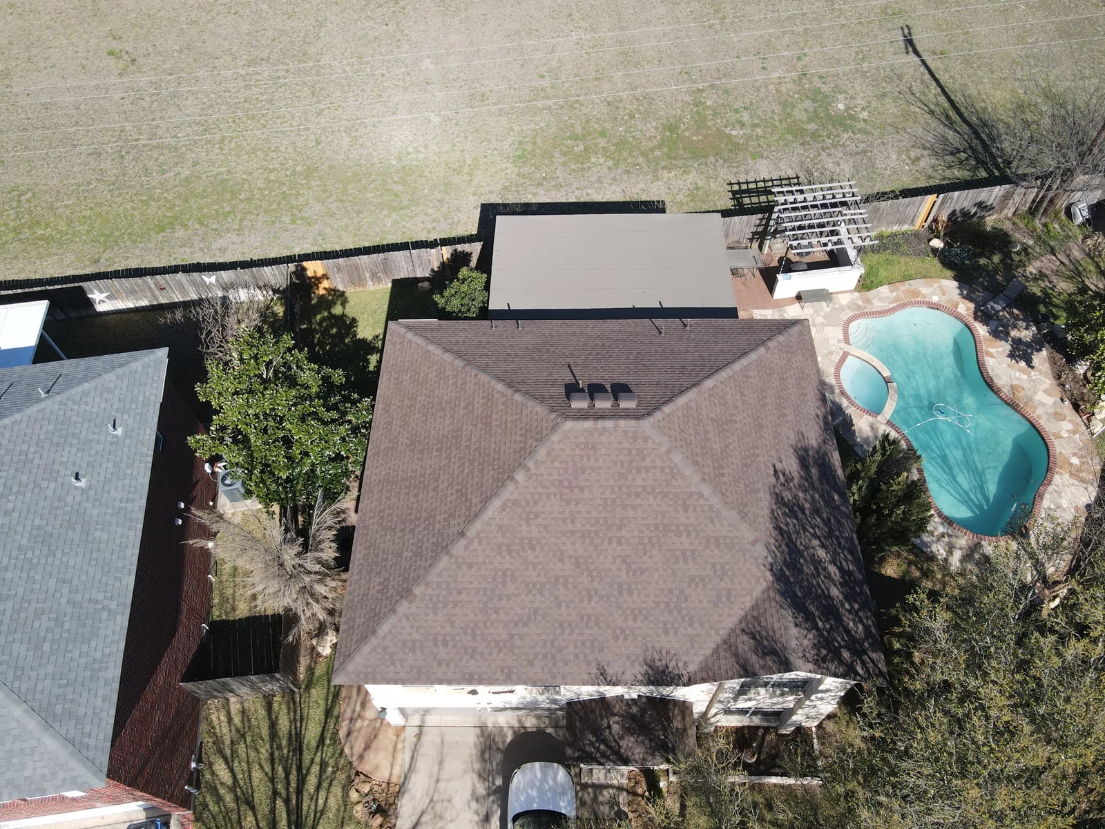 Finished GAF Timberline HD architectural shingle roof in Kyle, Texas.